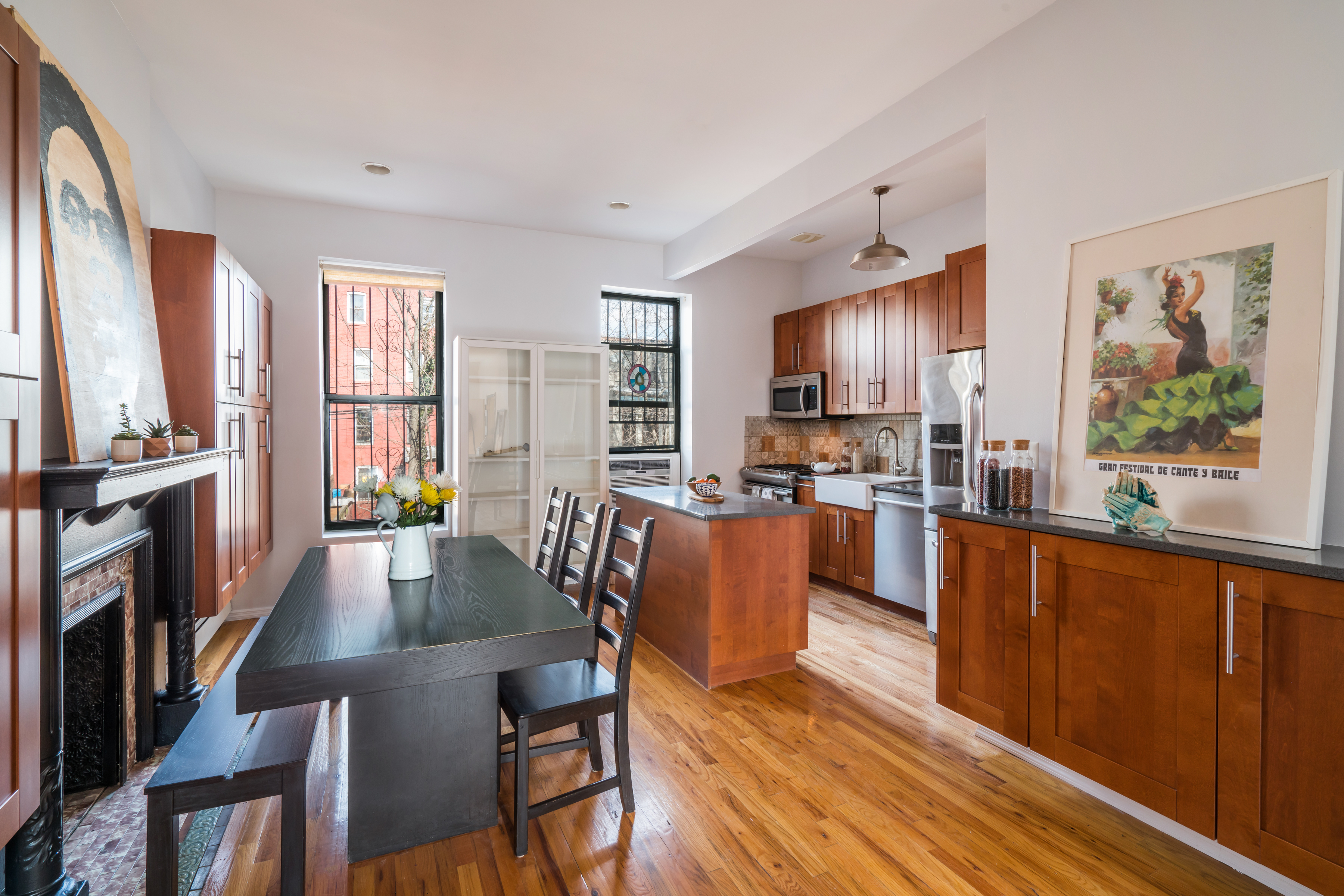 383 Bainbridge Street, Unit 1 Brooklyn, NY 11233 - Photo 1 of 14 a view of a dining room with furniture window and wooden floor