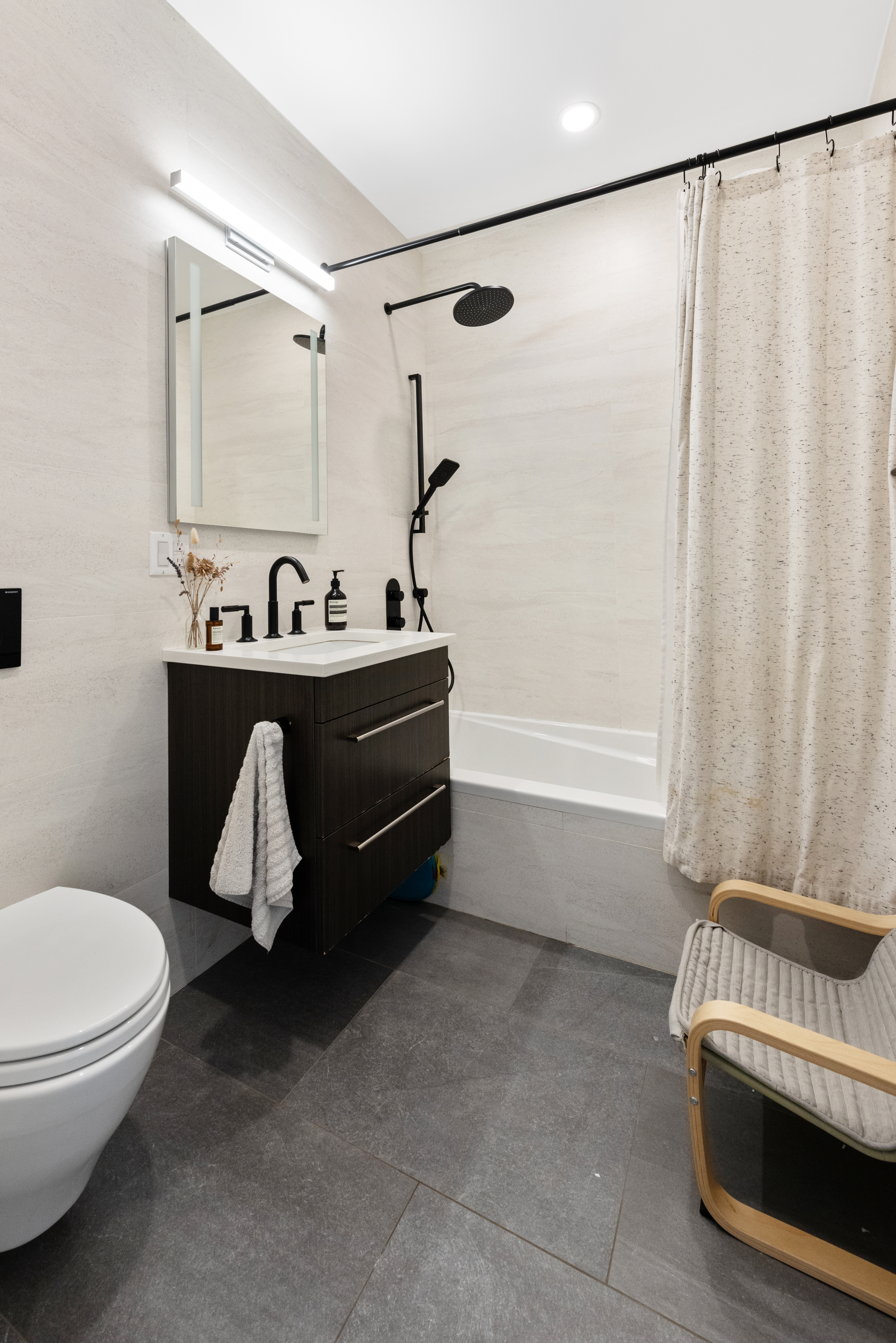 102 Huron Street, Unit 3B Brooklyn, NY 11222 - Photo 15 of 18 a bathroom with a sink and a mirror