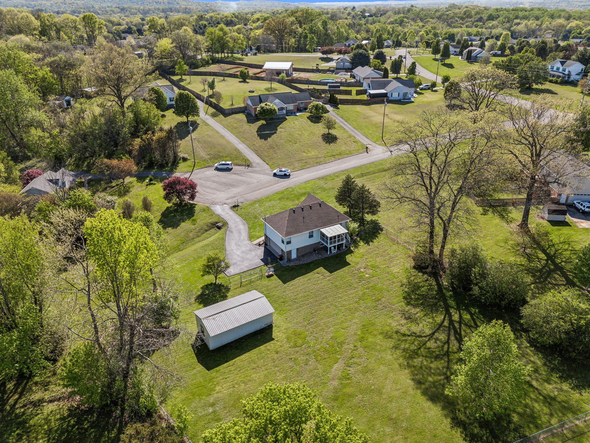 405 Billy Lane Spring Hill, TN 37174 - Photo 37 of 39 an aerial view of a house with a swimming pool