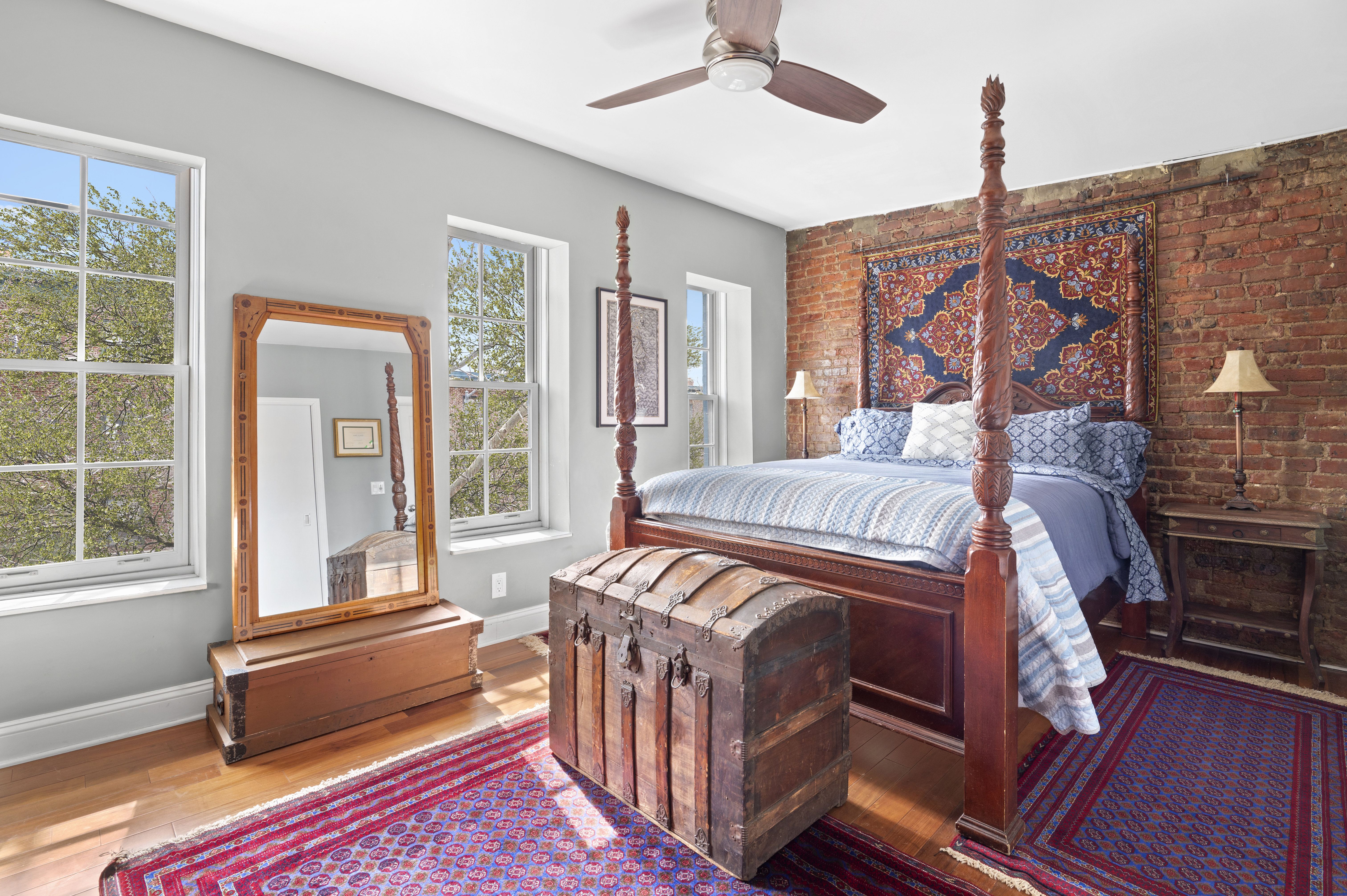 457 Warren Street Brooklyn, NY 11217 - Photo 8 of 16 a bedroom with furniture and a window