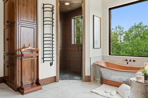 a utility room with sink dryer and washer