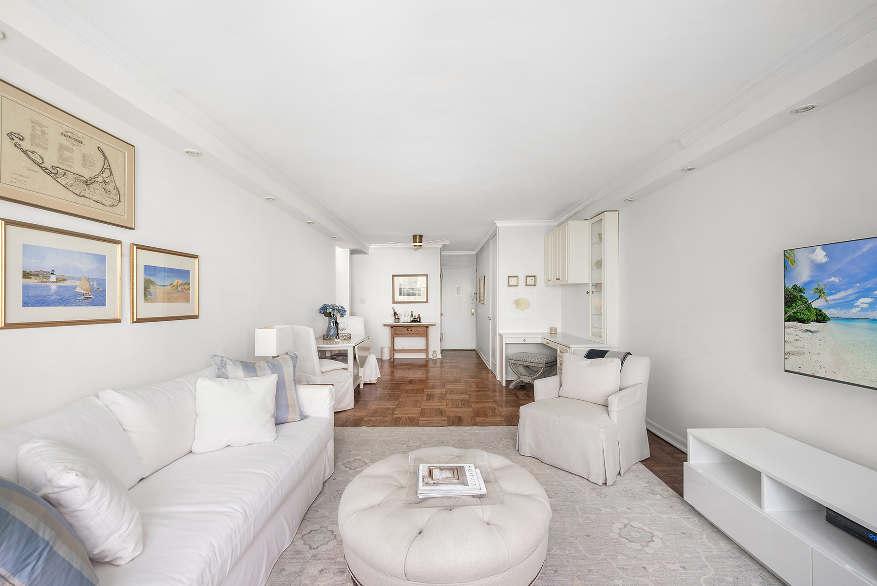 311 East 71st Street, Unit 2B Manhattan, NY 10021 - Photo 2 of 10 a living room with furniture and a couch