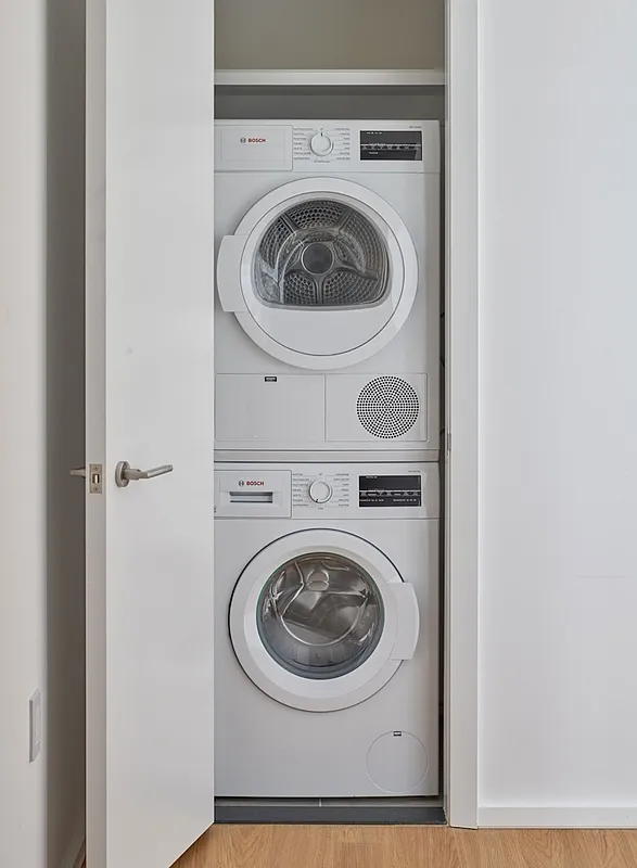 5 South 5th Street, Unit PH2B Brooklyn, NY 11249 - Photo 11 of 27 a utility room with dryer and washer