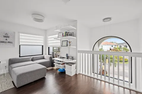 a view of a patio with a table and chairs
