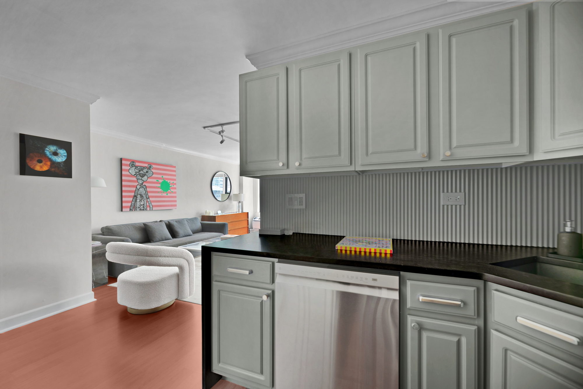 245 East 24th Street, Unit 10E Manhattan, NY 10010 - Photo 6 of 12 a kitchen with a sink and cabinets