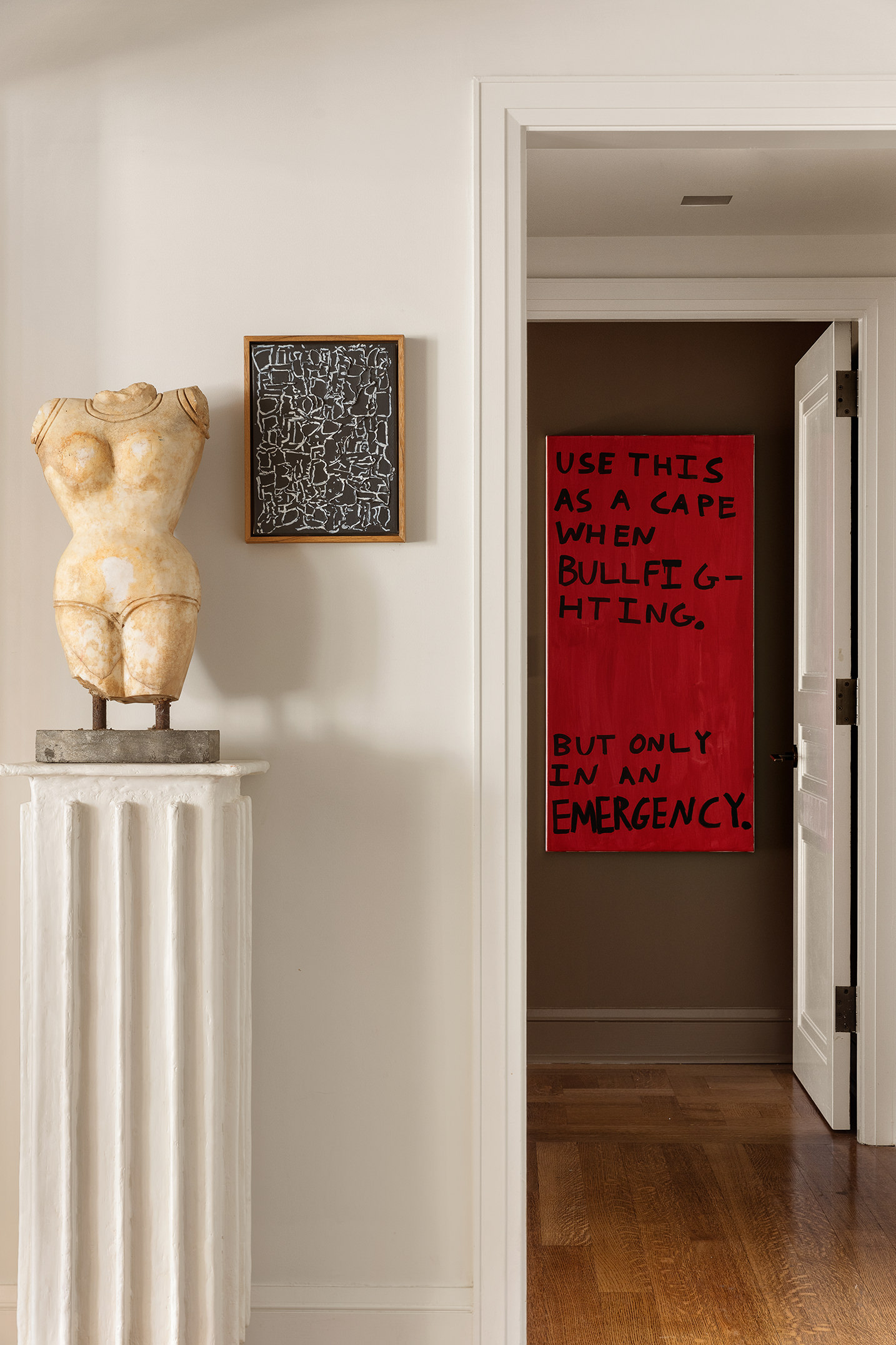 170 East End Avenue, Unit 7A Manhattan, NY 10128 - Photo 23 of 35 a view of a hallway with wooden floor and a bookshelf