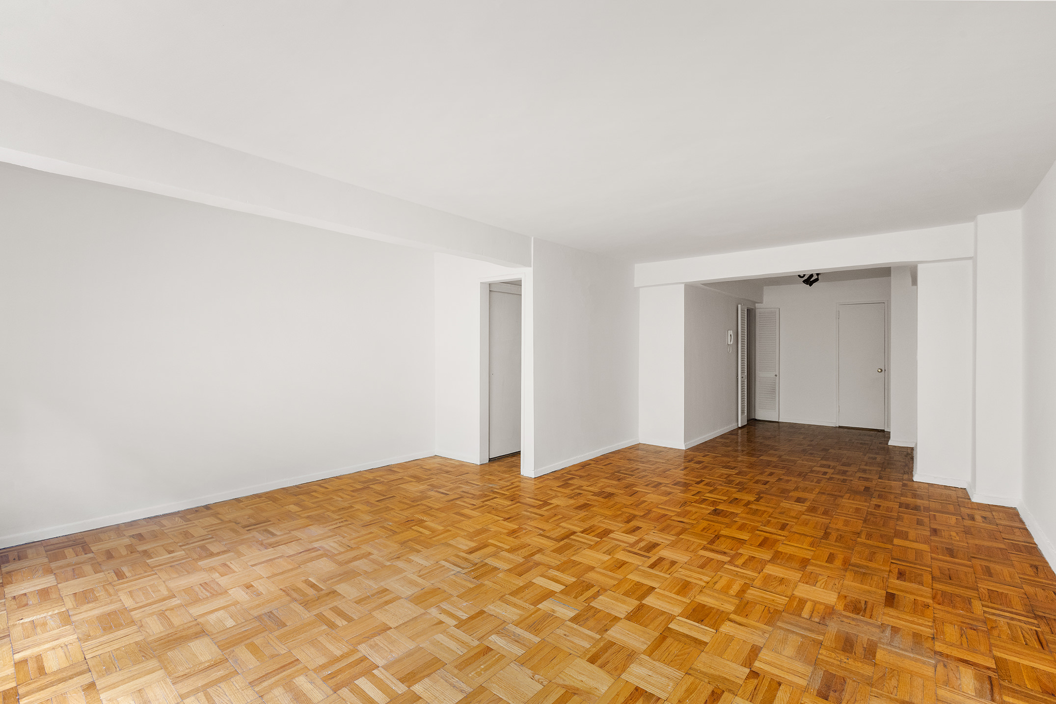 335 East 51st Street, Unit 3H Manhattan, NY 10022 - Photo 6 of 11 a view of empty room