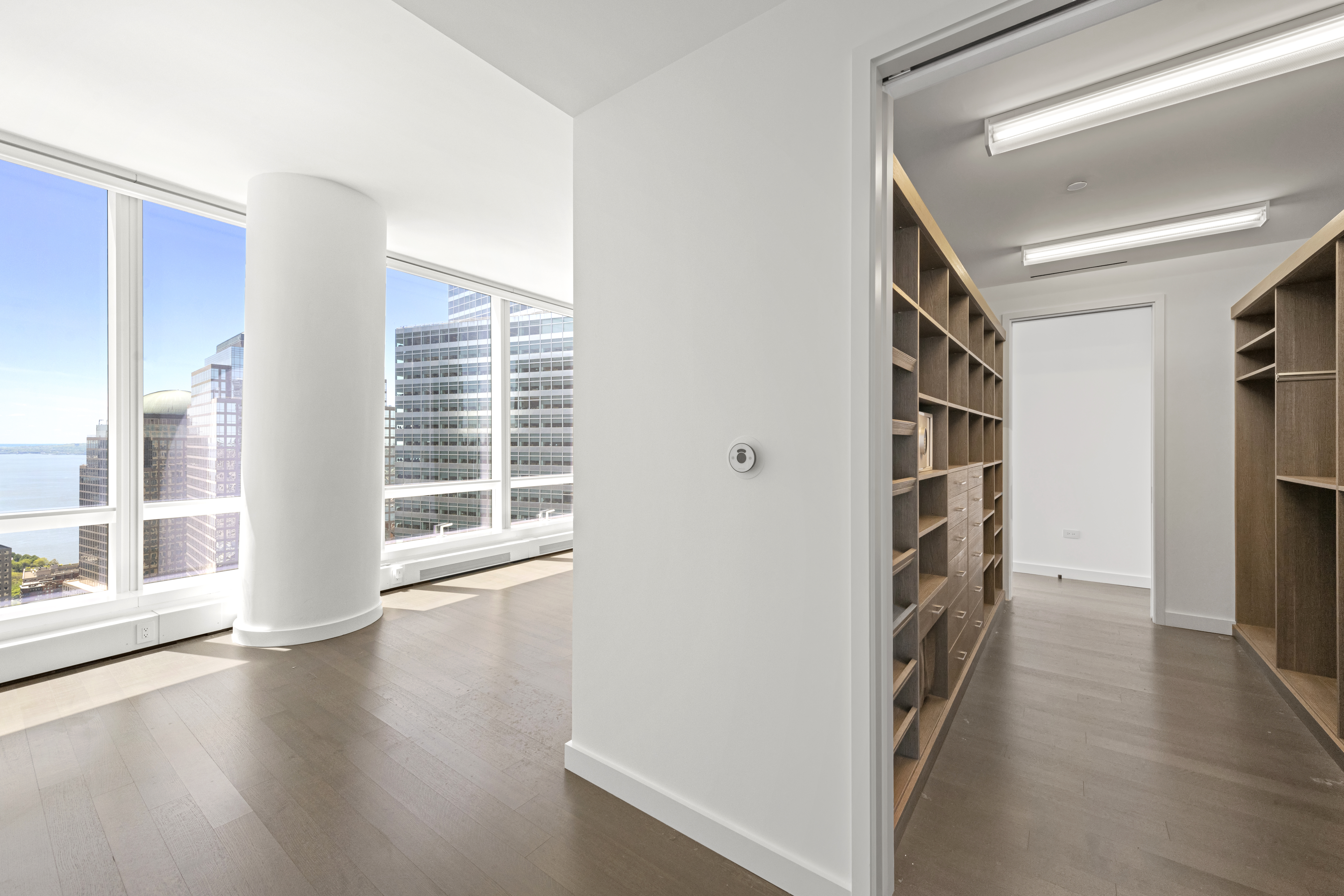 111 Murray Street, Unit 51EAST Manhattan, NY 10007 - Photo 14 of 42 a view of entryway with wooden floor and stairs