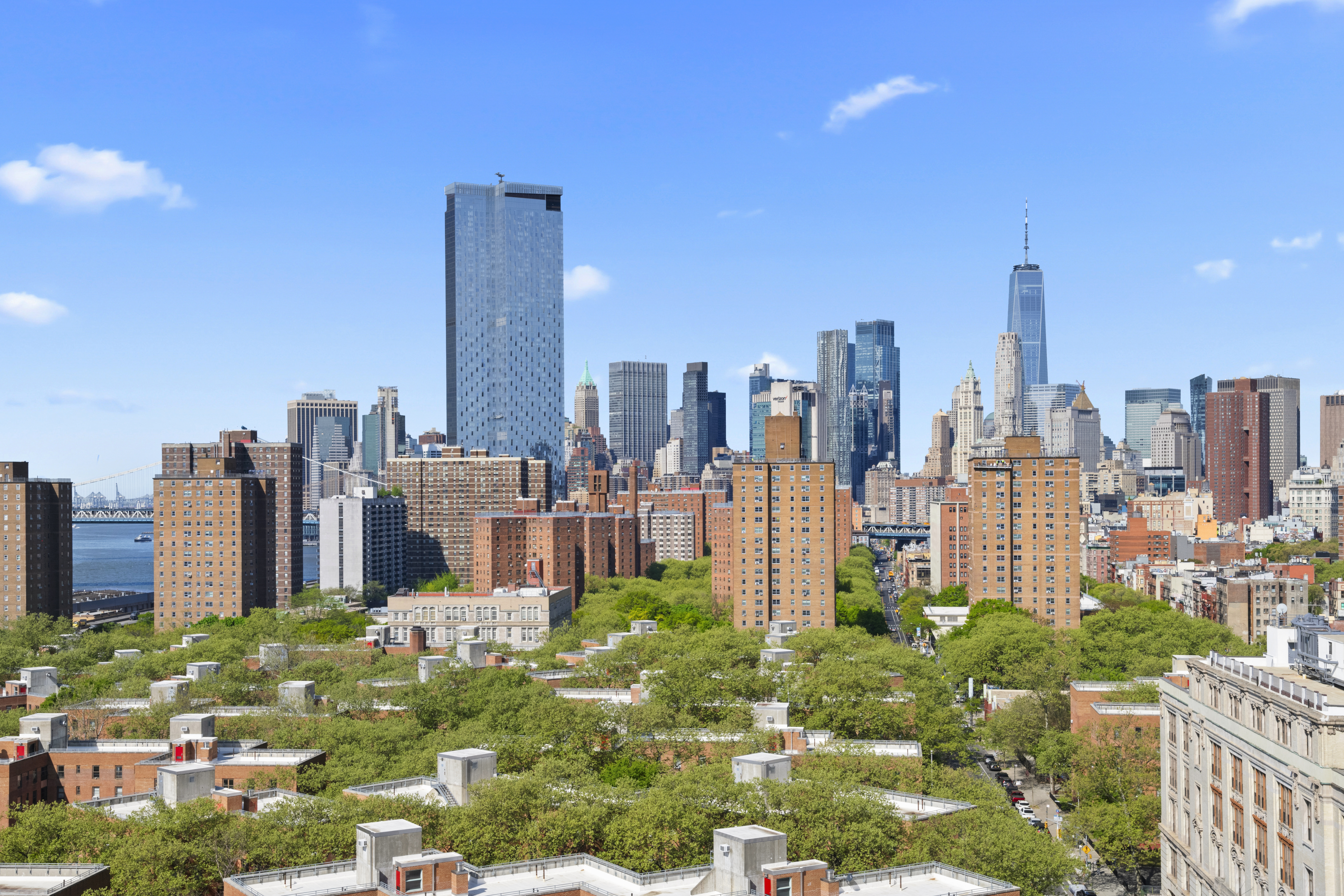 573 Grand Street, Unit D1707/1801 Manhattan, NY 10002 - Photo 21 of 24 a view of a city with tall buildings