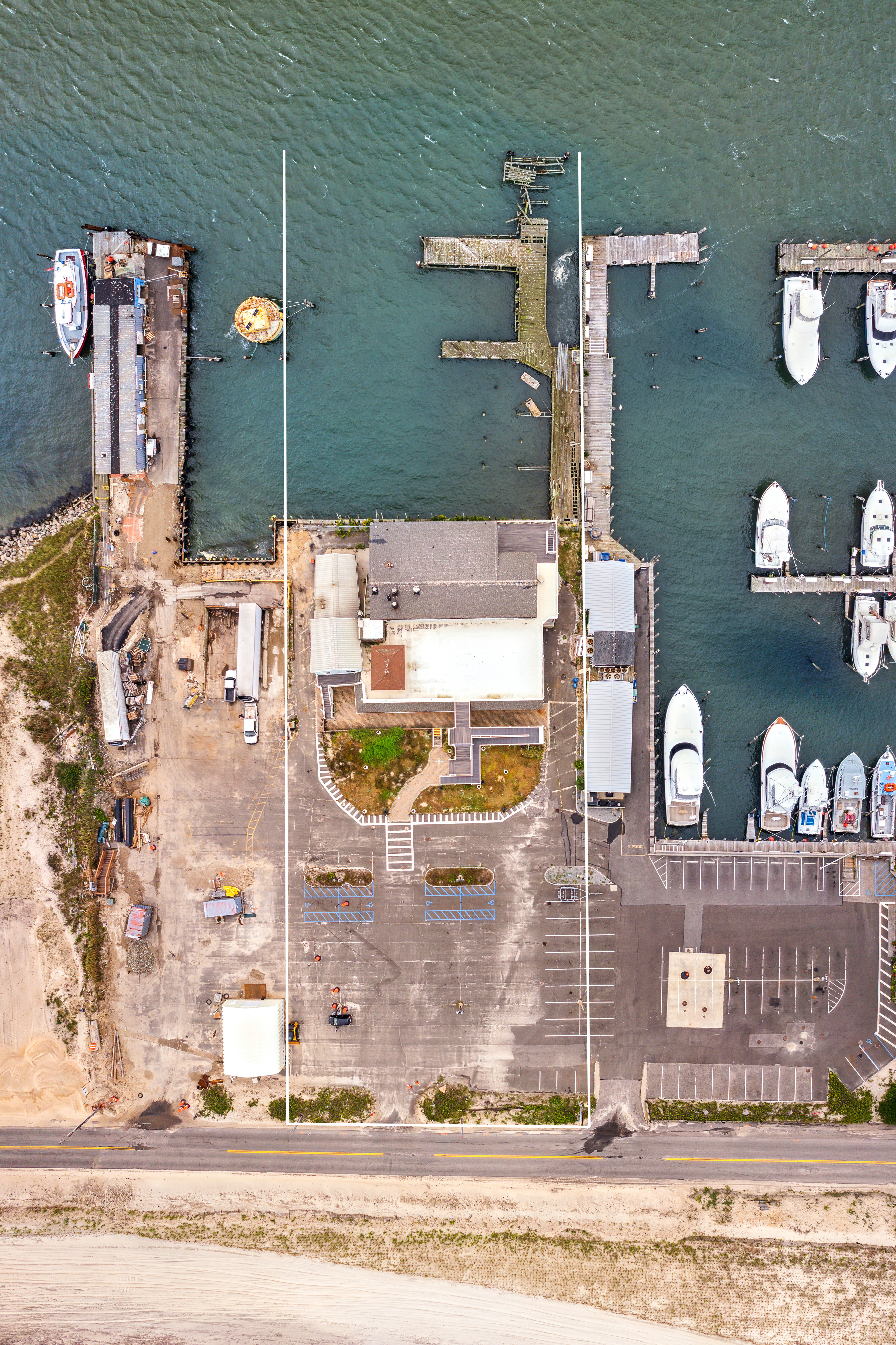 363 Beach Road Hampton Bays, NY 11959 - Photo 10 of 27 a bathroom with a sink and a mirror