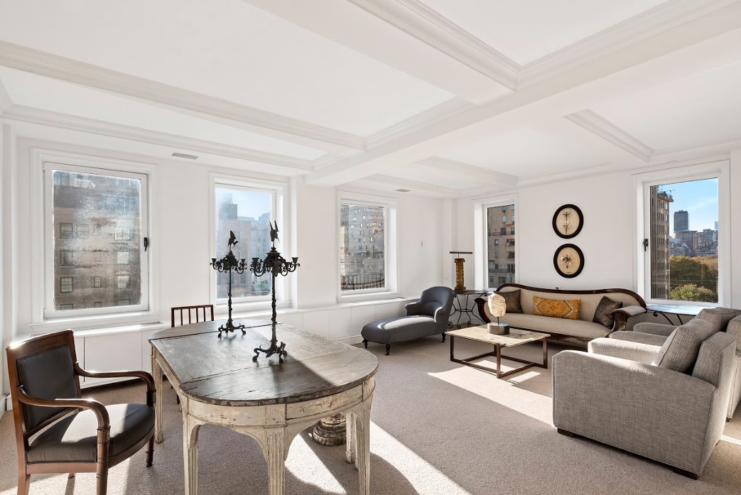 15 East 69th Street, Unit 10D Manhattan, NY 10021 - Photo 2 of 12 a living room with furniture and a large window