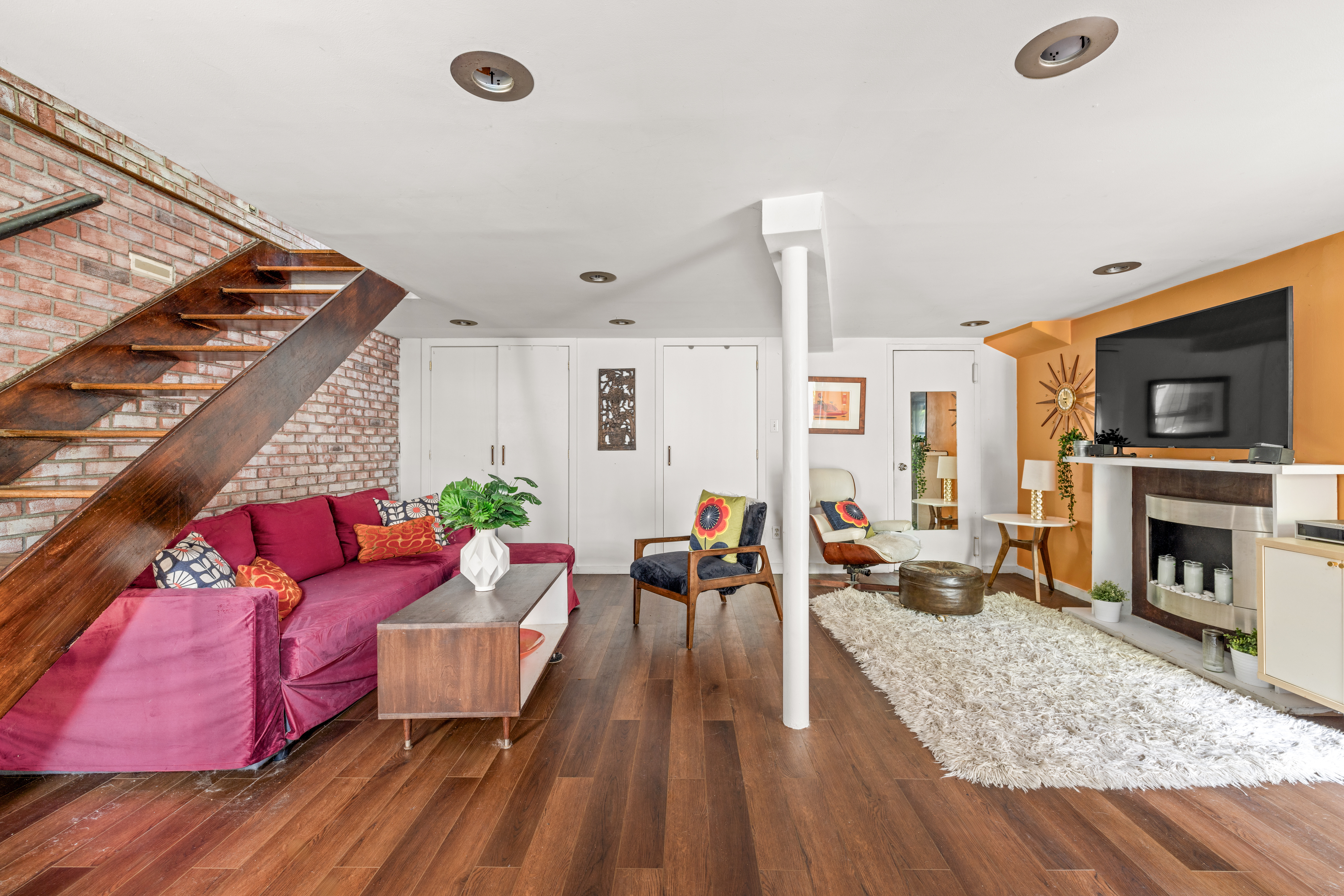 376 Bergen Street, Unit 1R Brooklyn, NY 11217 - Photo 4 of 10 a living room with furniture and a fireplace