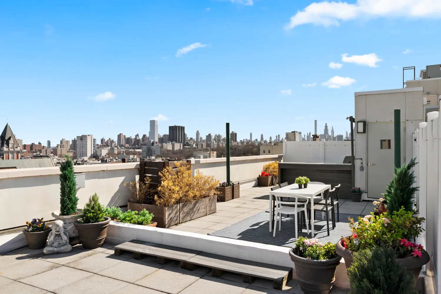 a view of a terrace with sitting area