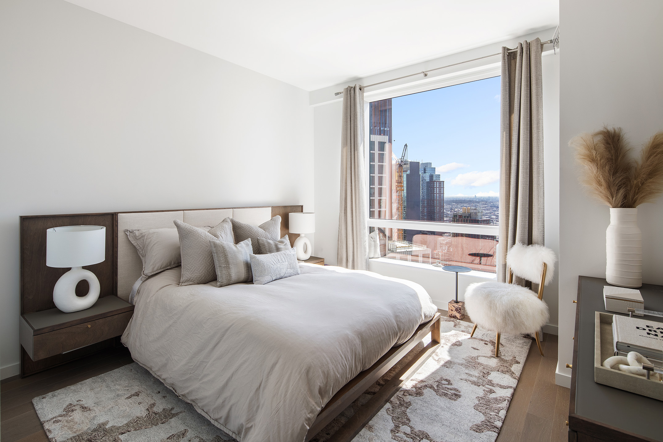 1 City Point, Unit 43H Brooklyn, NY 11201 - Photo 6 of 19 a bedroom with a bed and wooden floor