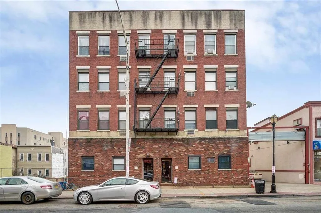 a car parked in front of a building