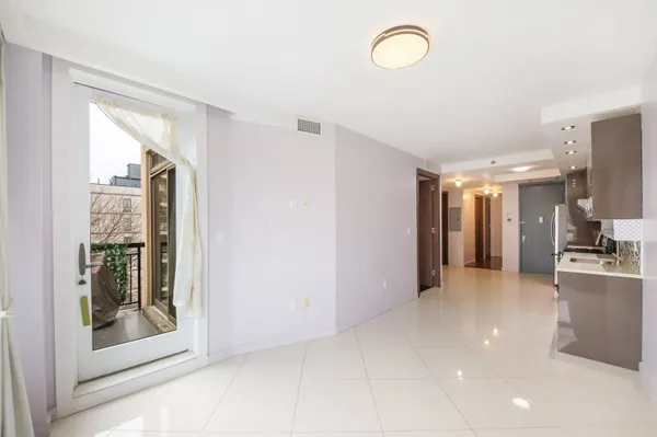 a view of a city with tall buildings