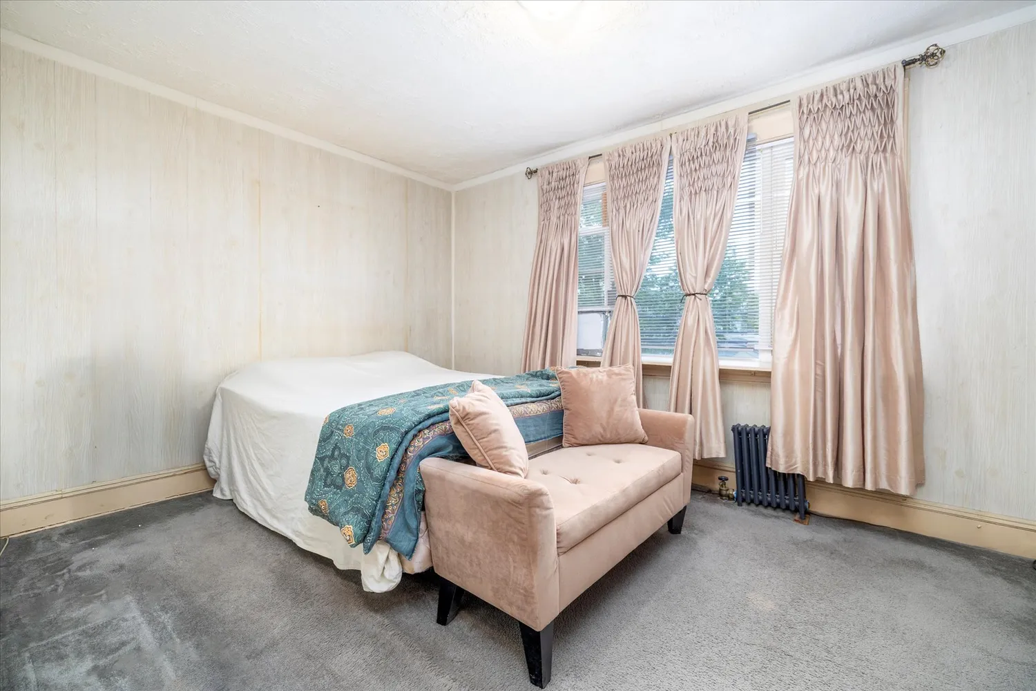 a bed room with a bed and a couch