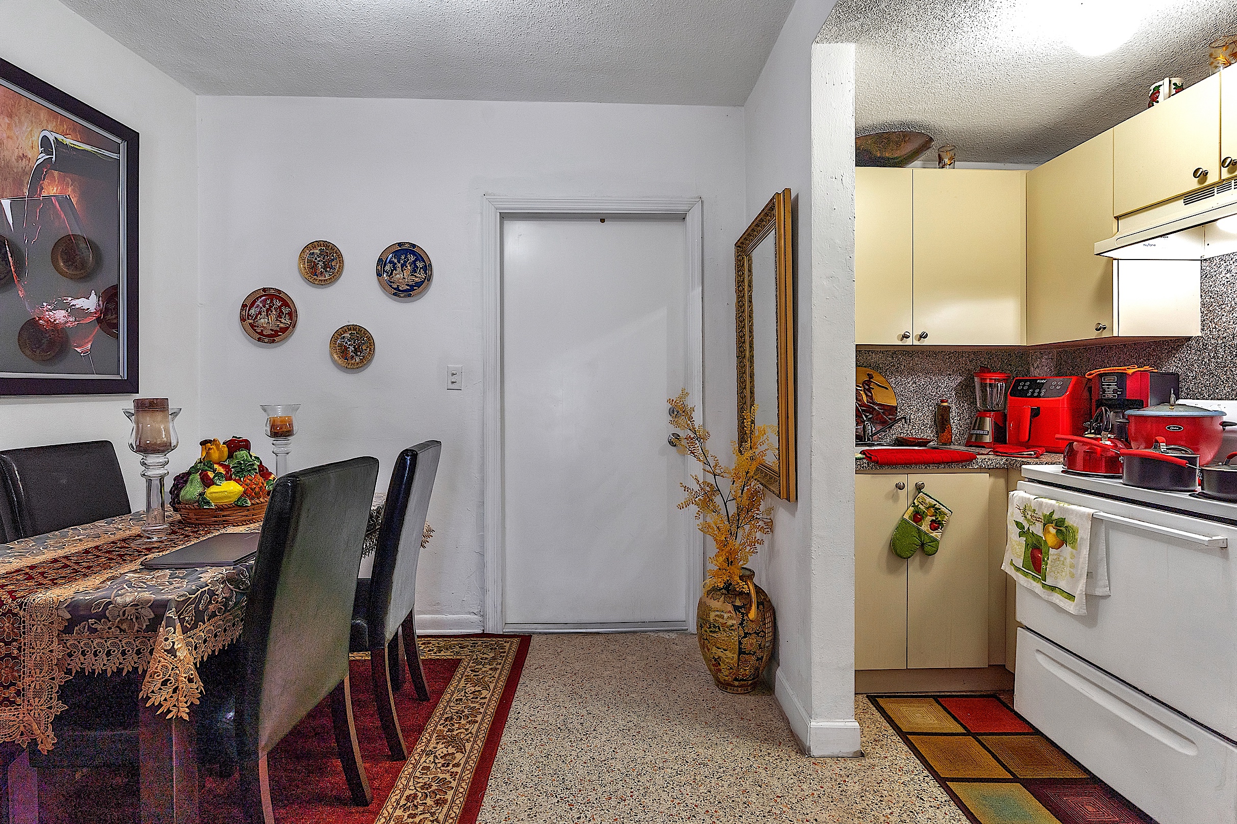 1361 Southwest 4th Street Miami, FL 33135 - Photo 7 of 23 a kitchen with a refrigerator and furniture