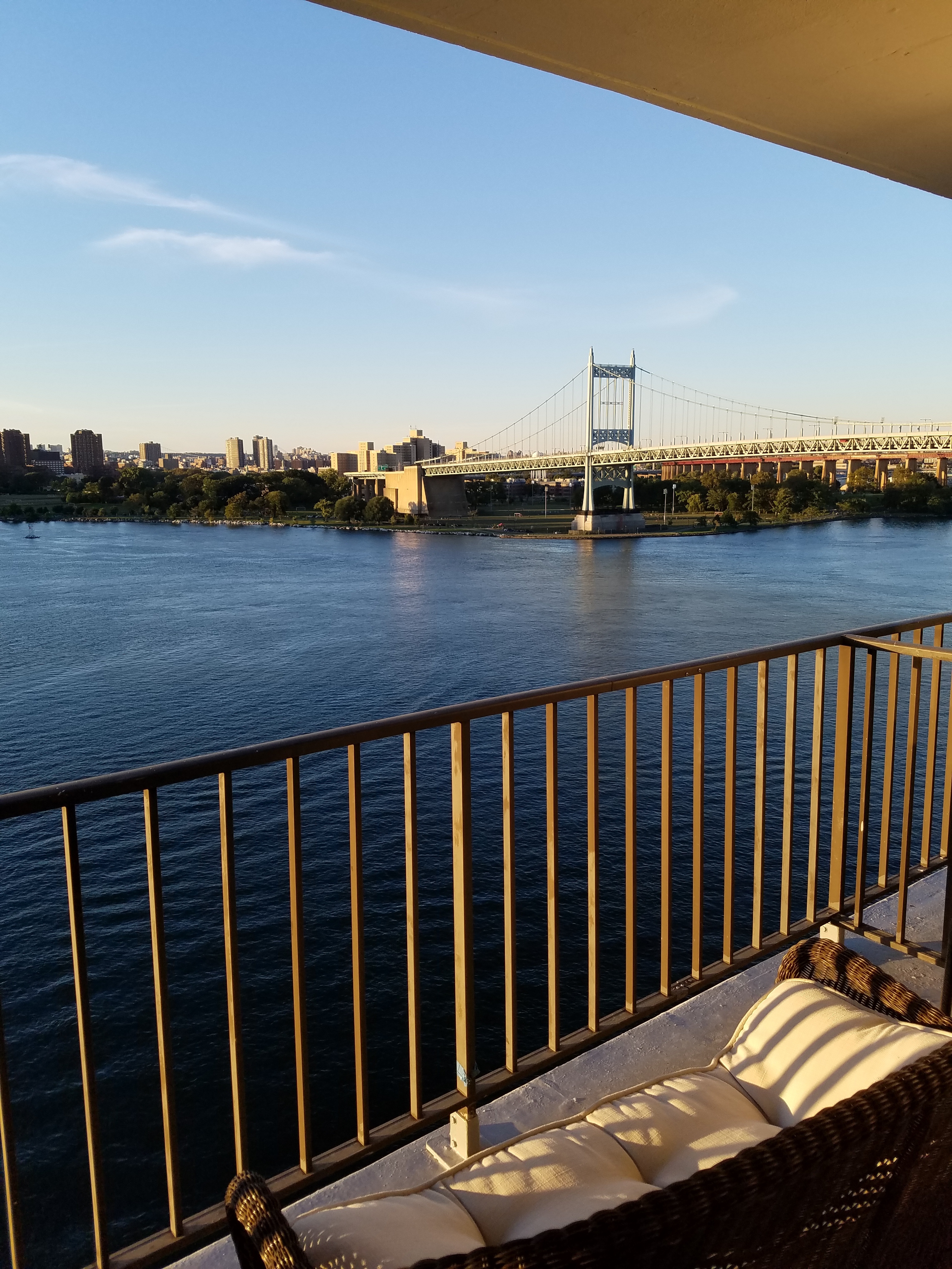 25-40 Shore Boulevard, Unit 15T Queens, NY 11102 - Photo 11 of 22 a view of a roof deck with wooden floor and fence