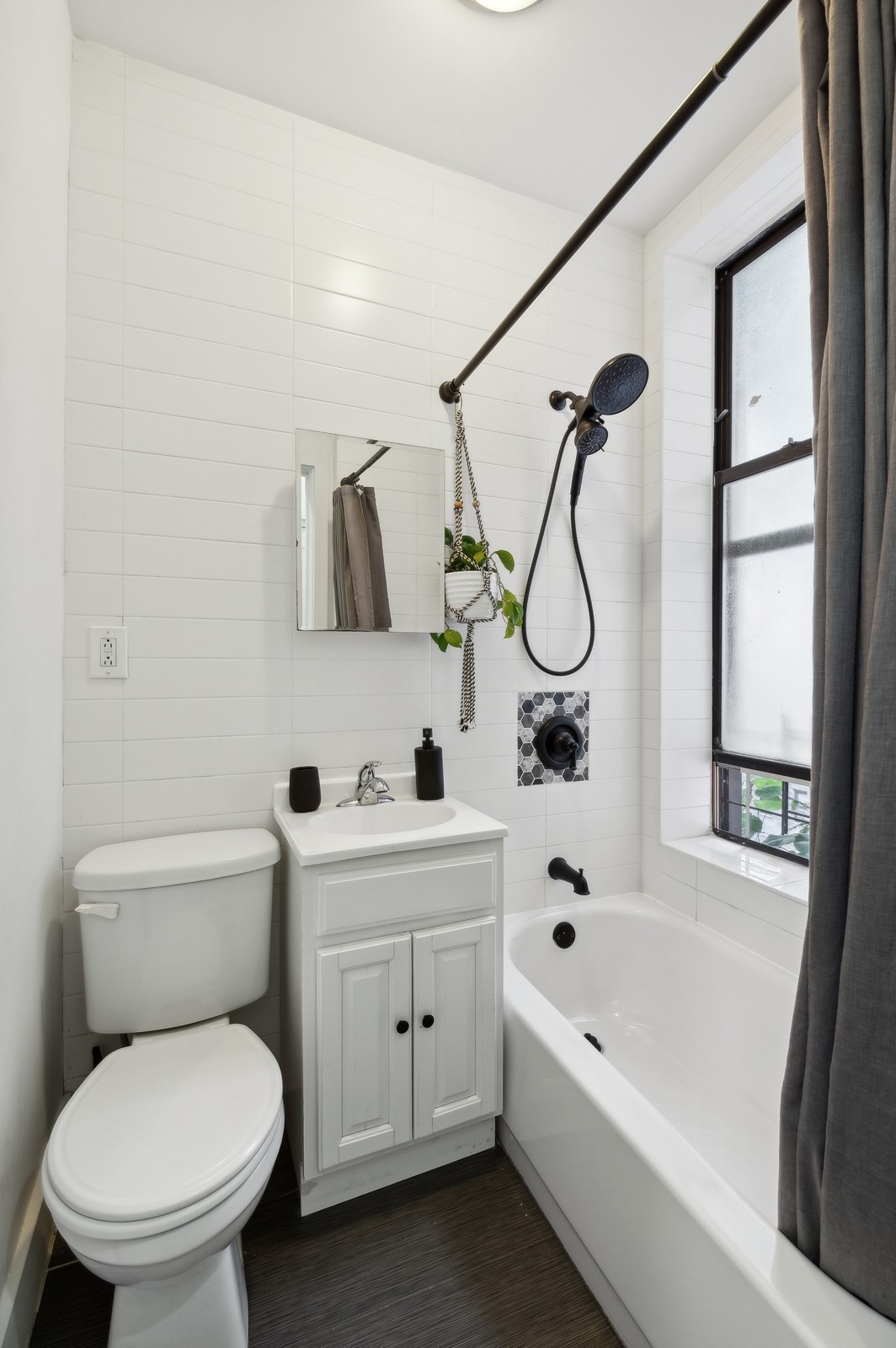 66 West 138th Street, Unit 3A Manhattan, NY 10037 - Photo 5 of 8 a bathroom with a toilet sink and bathtub
