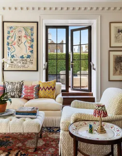 a living room with furniture and window