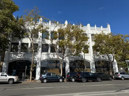a view of a building and a street