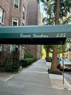 a view of a building with a garden