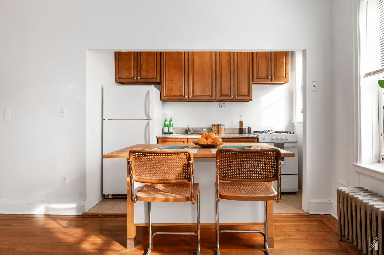 59-11 Queens Boulevard, Unit 3J Queens, NY 11377 - Photo 6 of 18 a dining room with furniture and wooden floor
