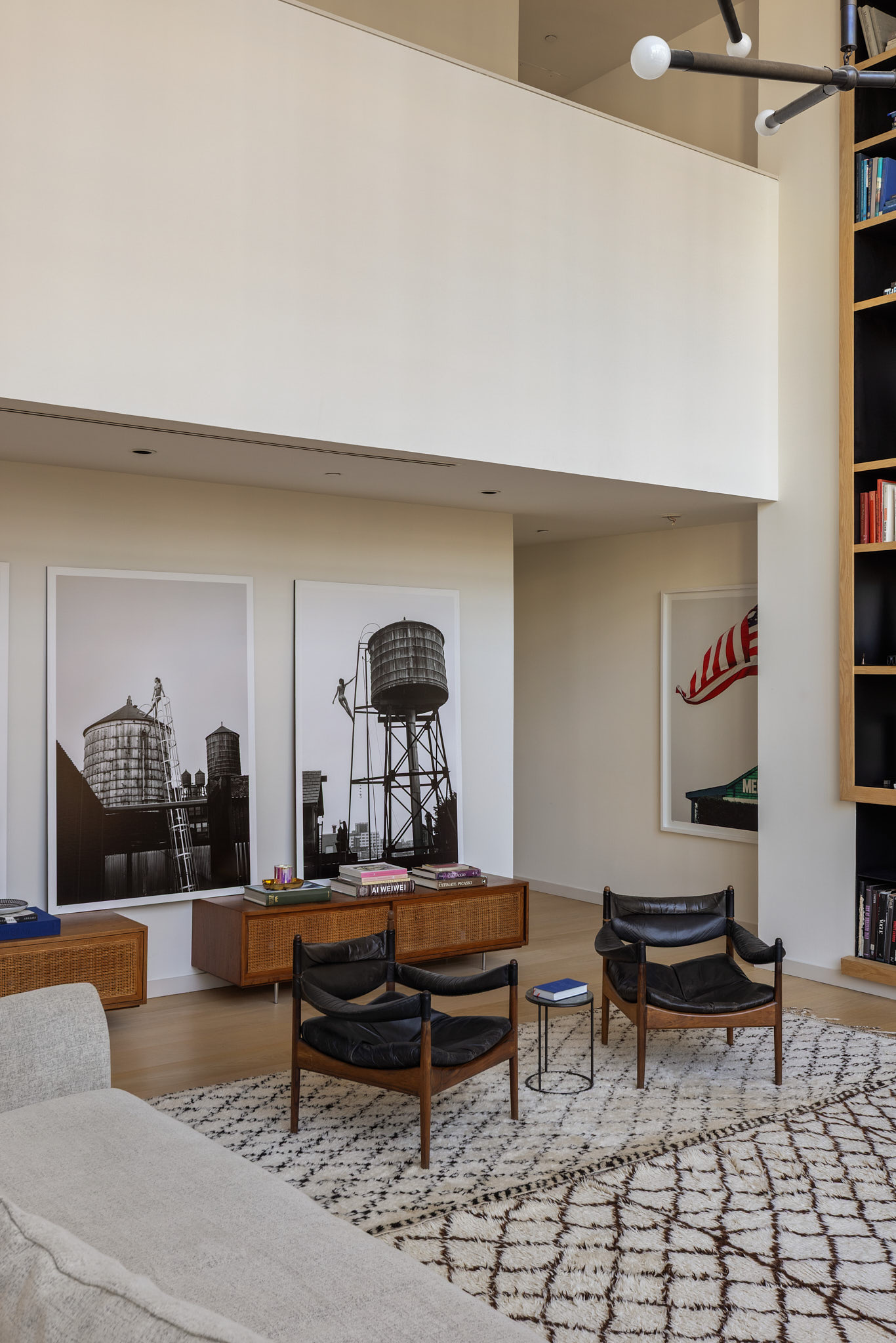 456 West 19th Street, Unit PHH Manhattan, NY 10011 - Photo 4 of 21 a living room with furniture and a rug