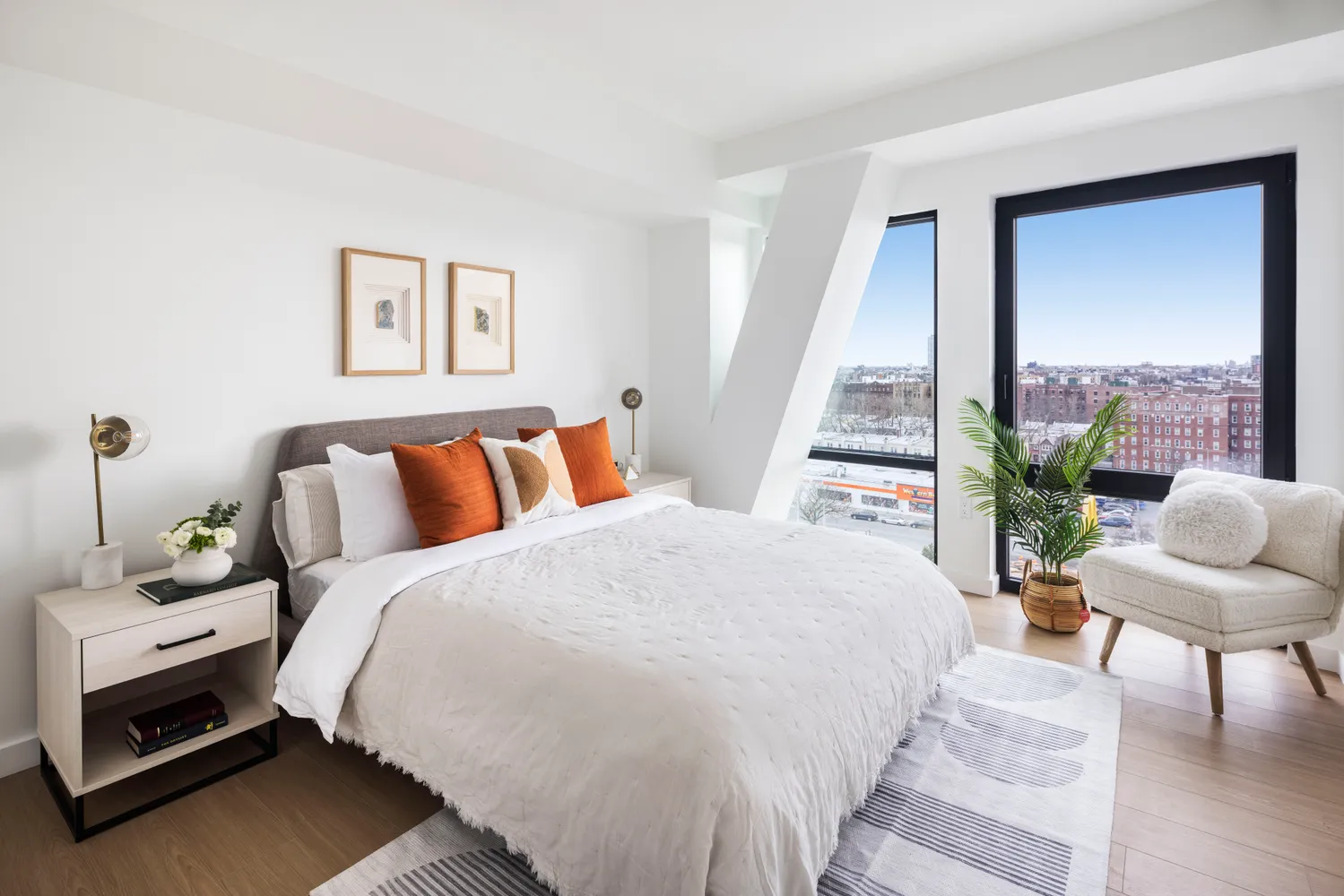 a bed room with a bed and a chair