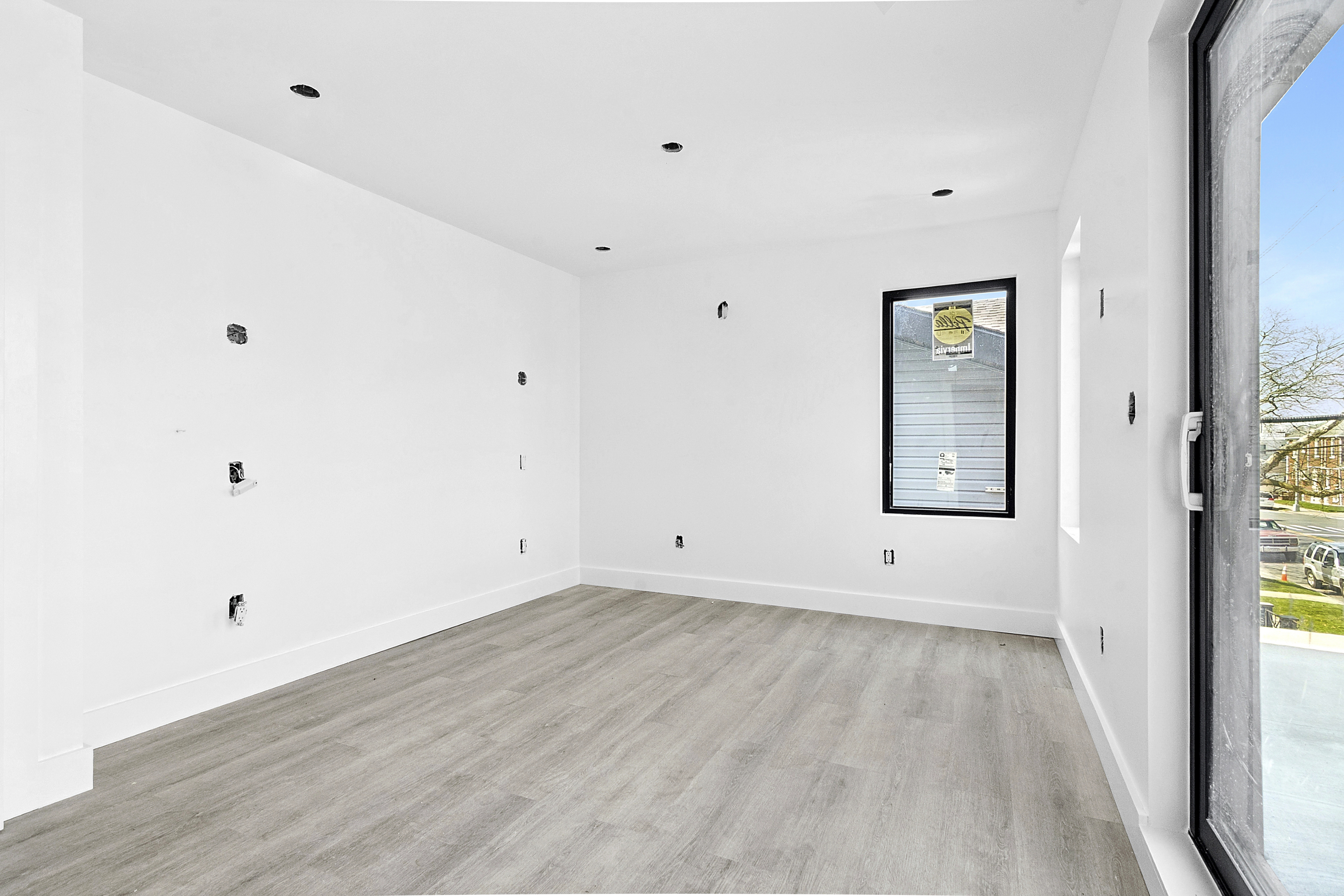 3624 Avenue P Brooklyn, NY 11234 - Photo 8 of 26 a view of room with window and hardwood floor