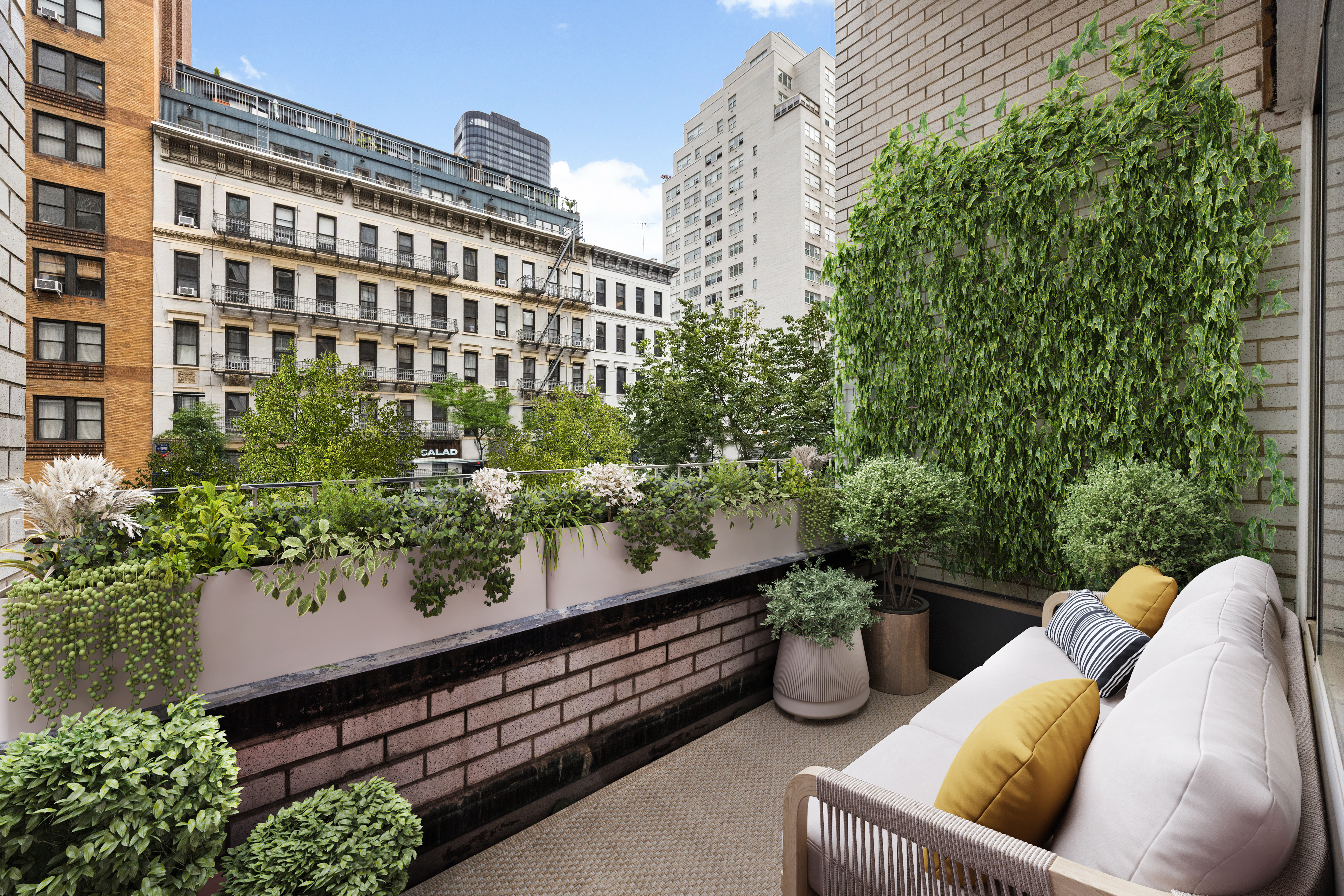 a view of a roof deck with furniture