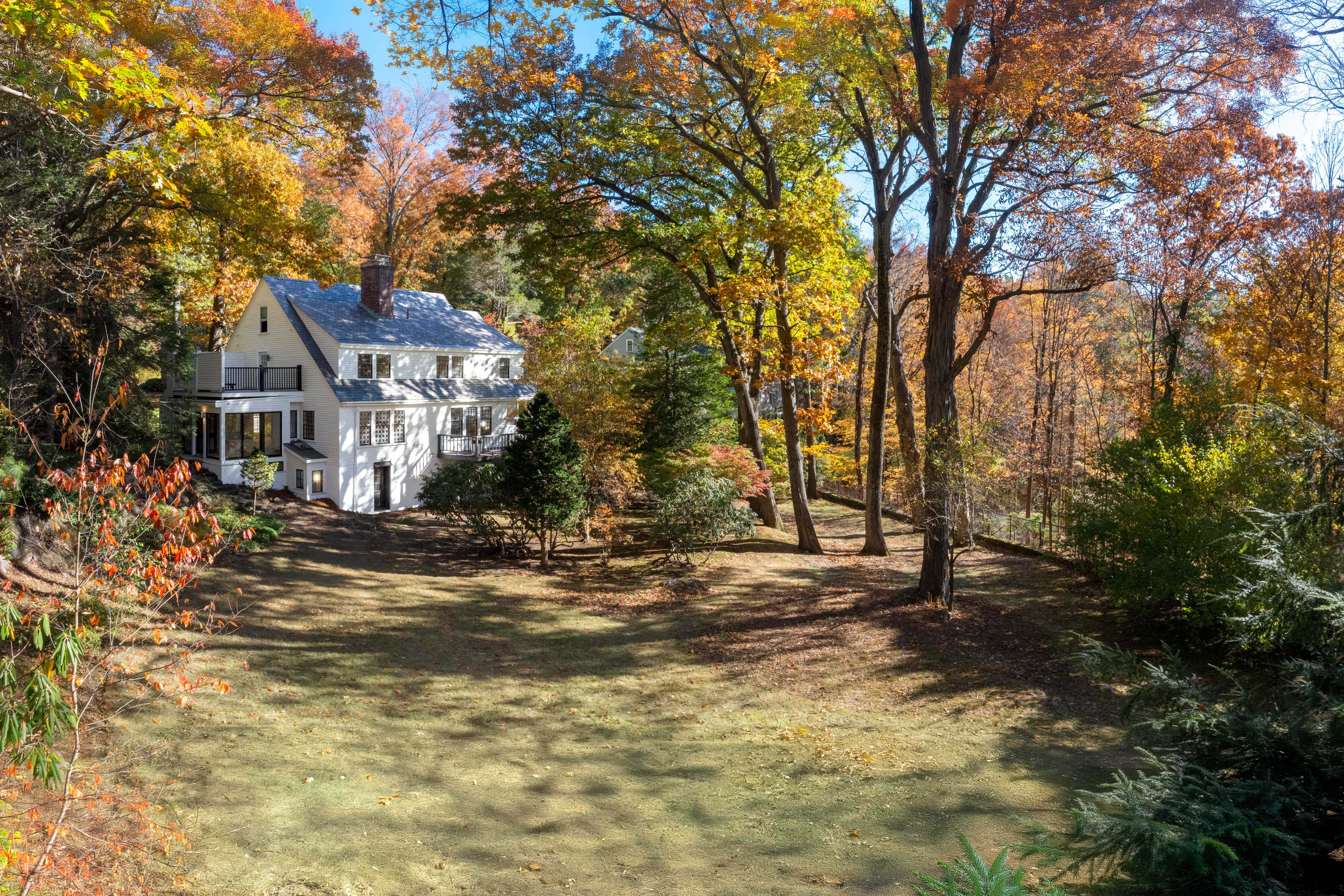 111 Beverly Road Brookline, MA 02467 - Photo 3 of 27 a view of a house with a large tree