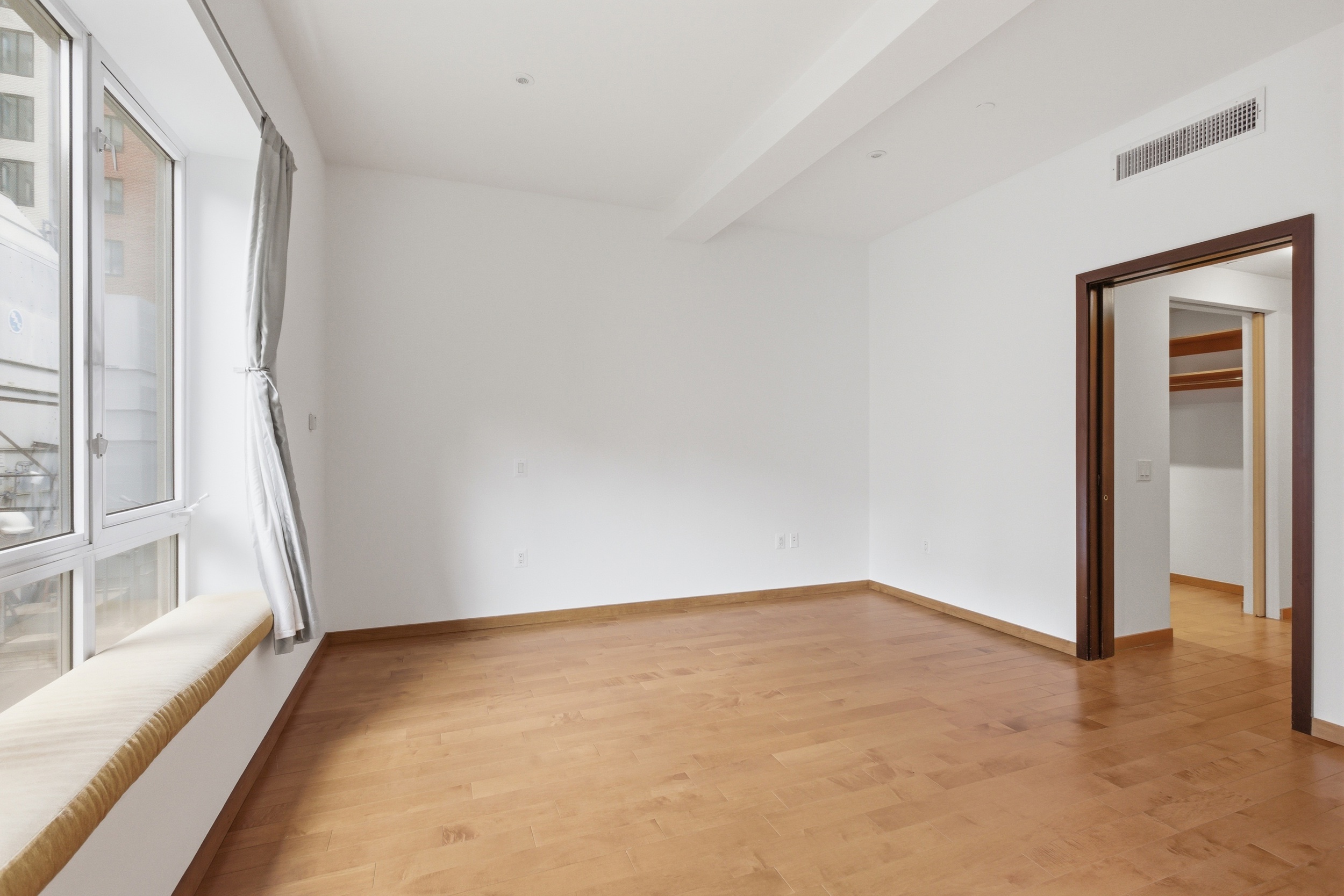 135 West 4th Street, Unit 3W Manhattan, NY 10012 - Photo 12 of 24 an empty room with windows