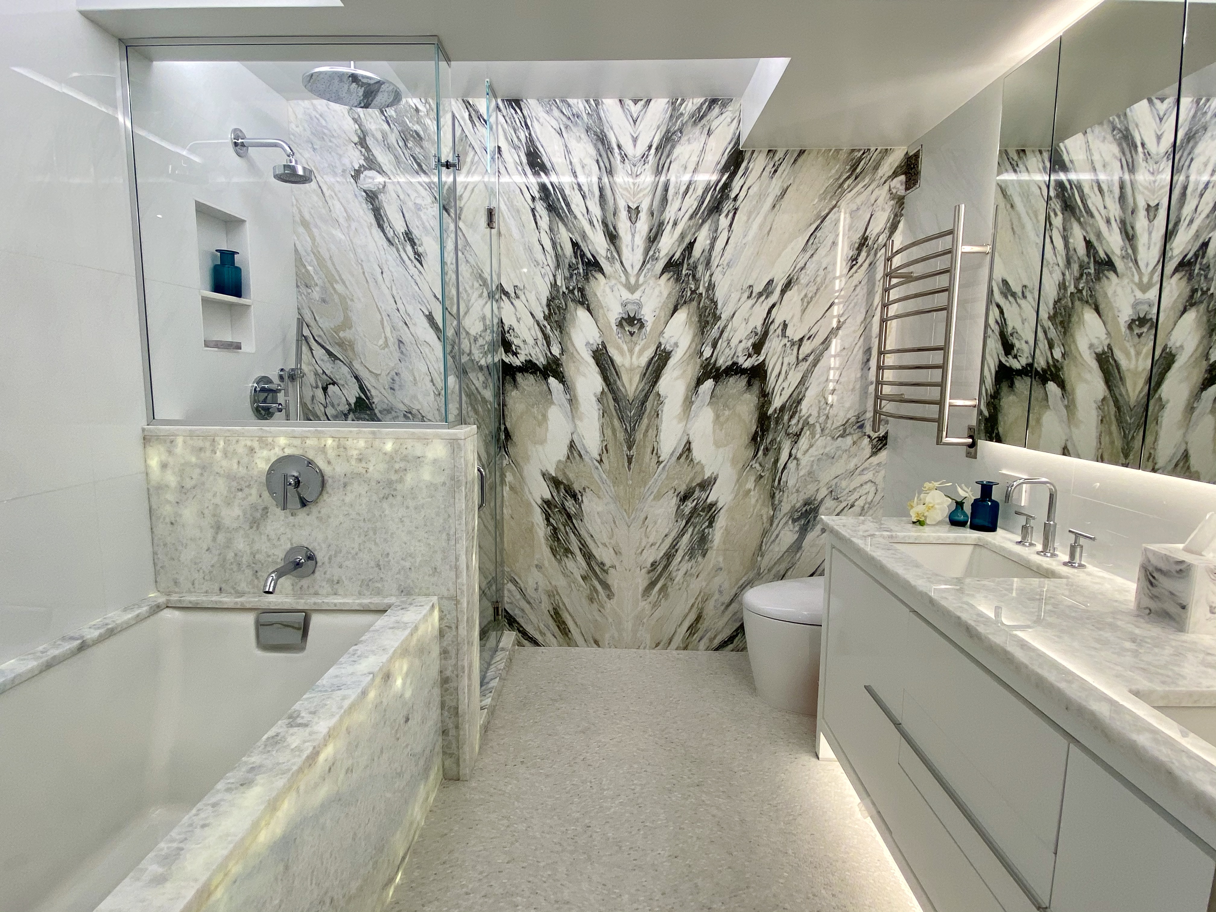 350 West 53rd Street, Unit PHB Manhattan, NY 10019 - Photo 14 of 34 a bathroom with a bathtub sink and toilet