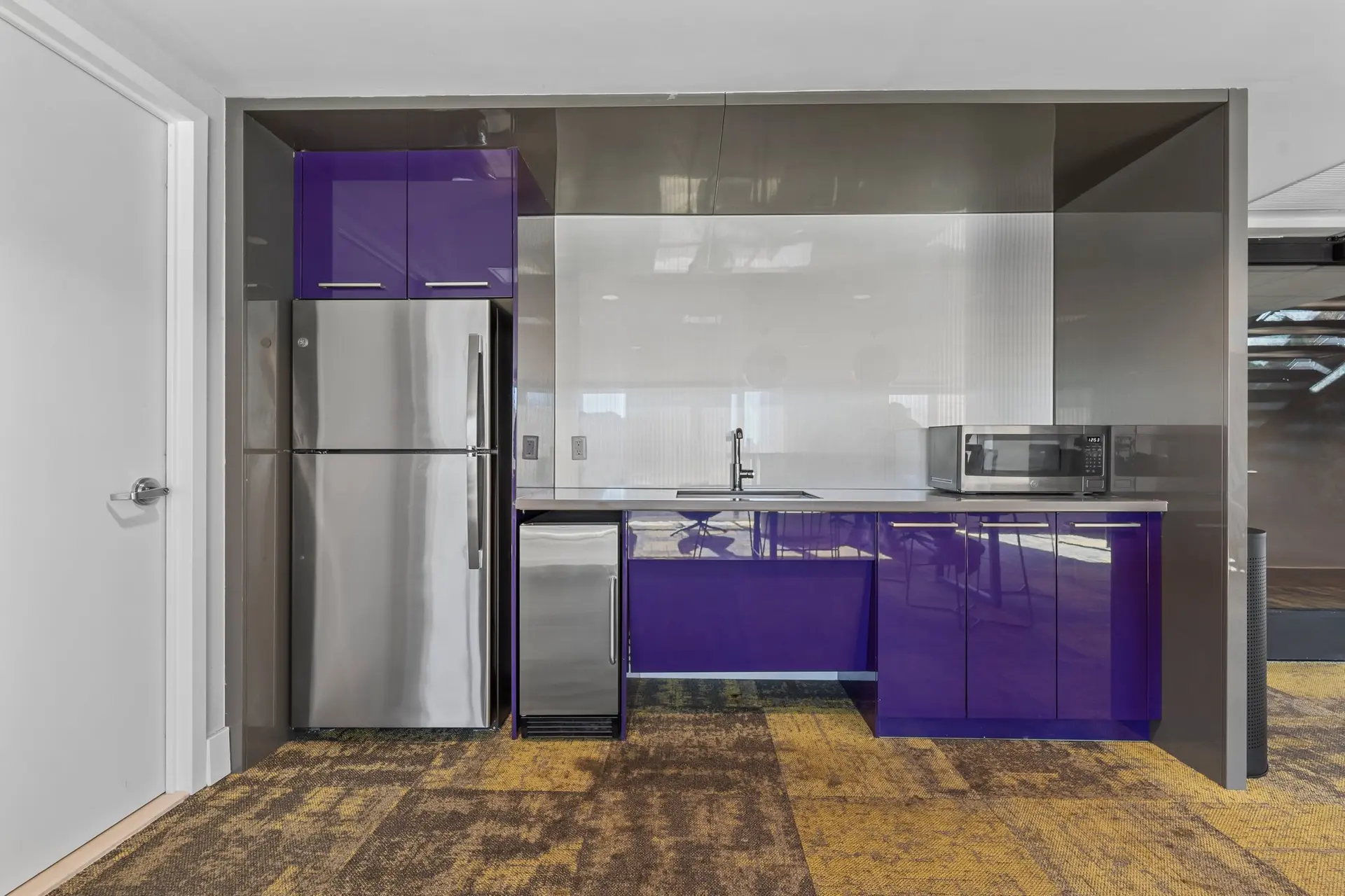 350 Clarkson Avenue, Unit 103 Brooklyn, NY 11226 - Photo 21 of 42 a kitchen with stainless steel appliances granite countertop a refrigerator and a stove