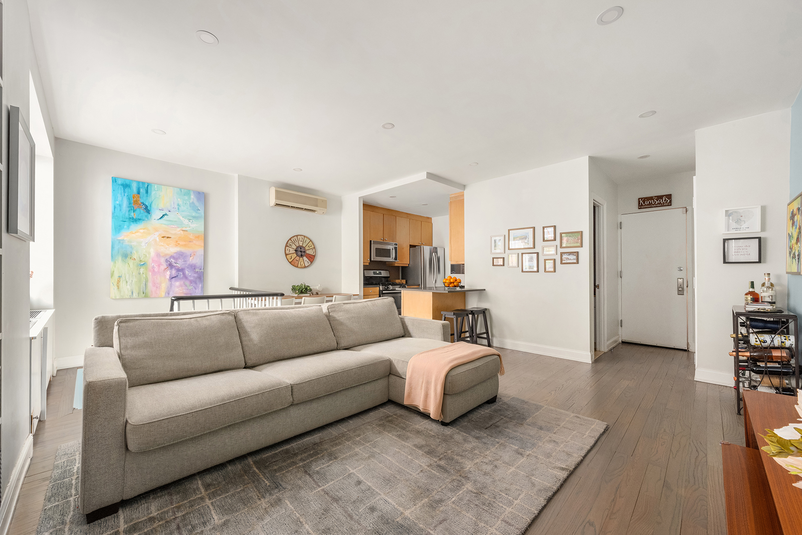 304 West 88th Street, Unit GC Manhattan, NY 10024 - Photo 3 of 16 a living room with furniture and painting on the wall