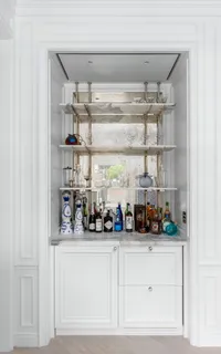 a kitchen with a refrigerator and cabinets