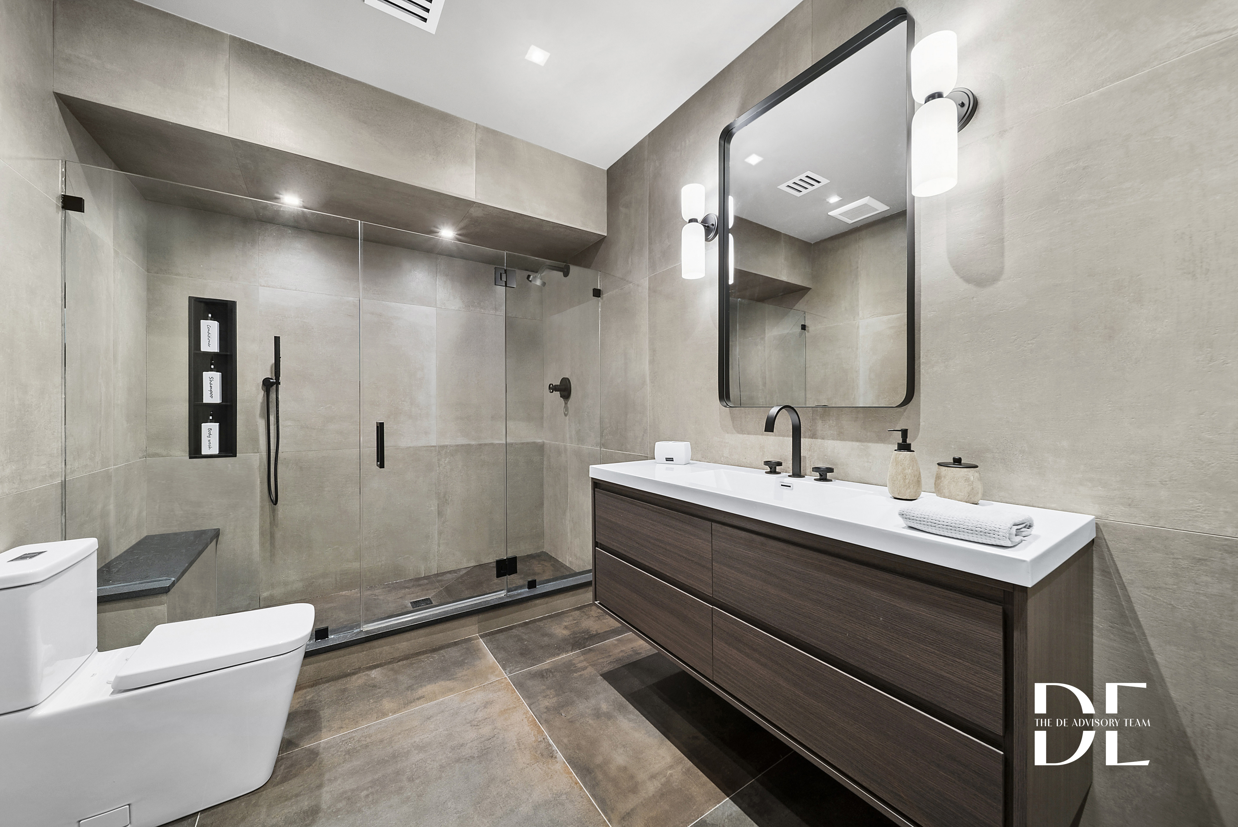 52 Nicolosi Loop Staten Island, NY 10312 - Photo 19 of 23 a bathroom with a double vanity sink mirror and toilet