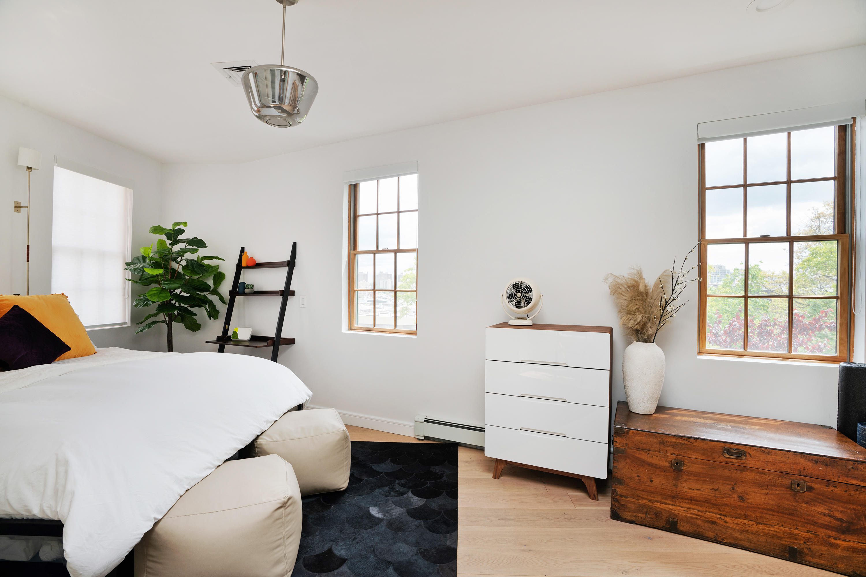 334 Plymouth Street Brooklyn, NY 11201 - Photo 9 of 32 a room with a bed and a window