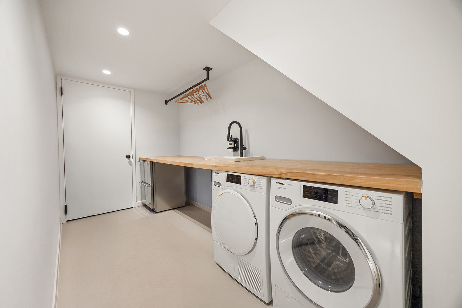 125 Rutland Road Brooklyn, NY 11225 - Photo 16 of 22 a utility room with dryer and washer