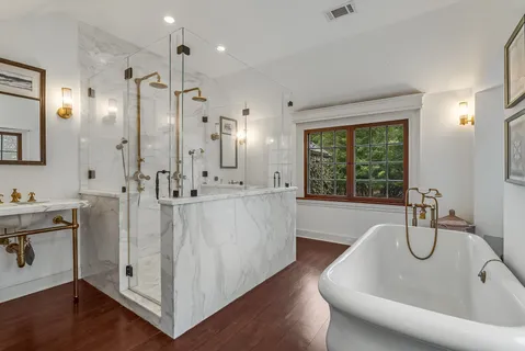 a view of a house with a yard and garage