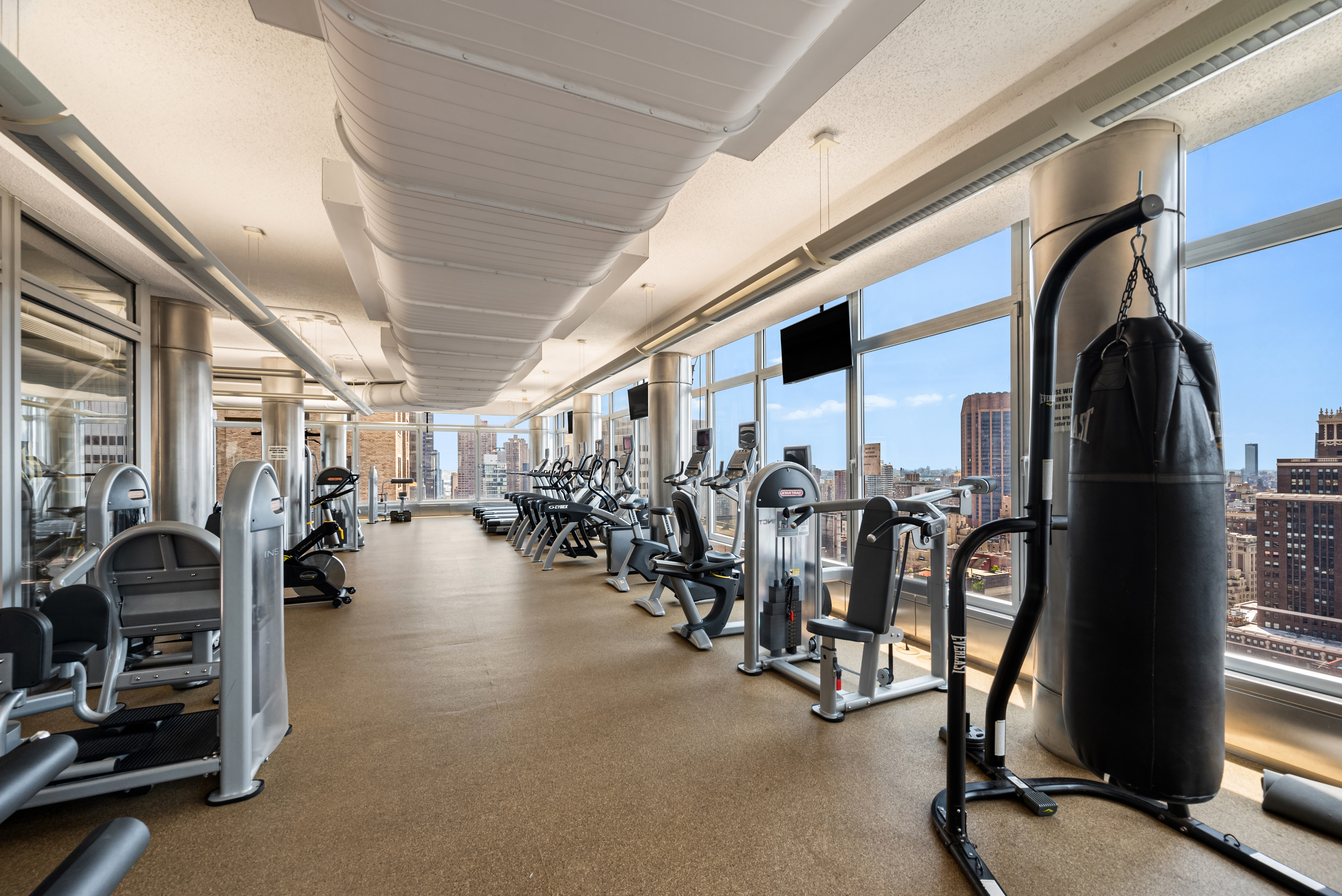 445 5th Avenue, Unit 26C Manhattan, NY 10016 - Photo 8 of 11 a view of a room with gym equipment