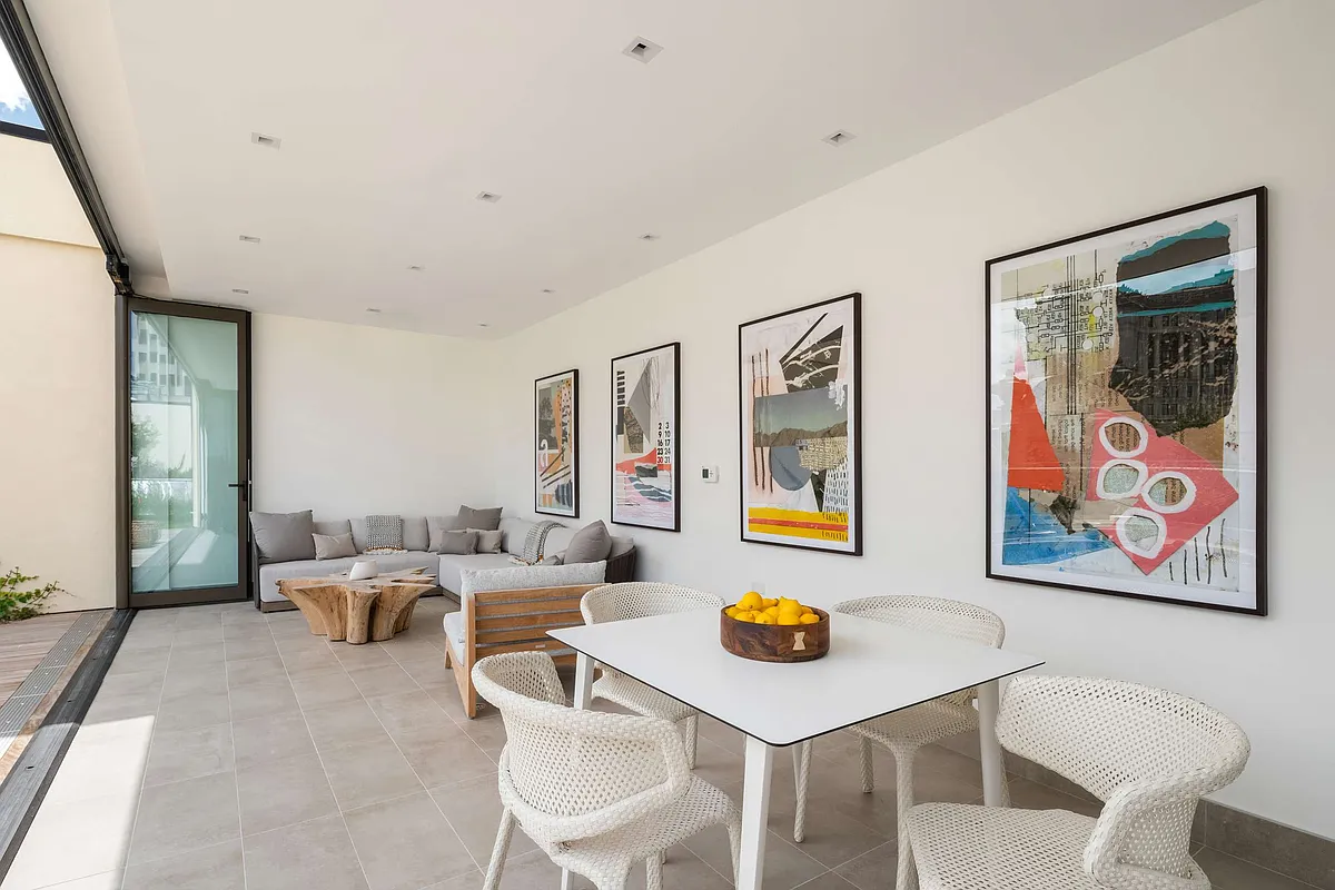 49 Chambers Street, Unit 9G Manhattan, NY 10007 - Photo 15 of 28 a view of a livingroom with furniture and kitchen