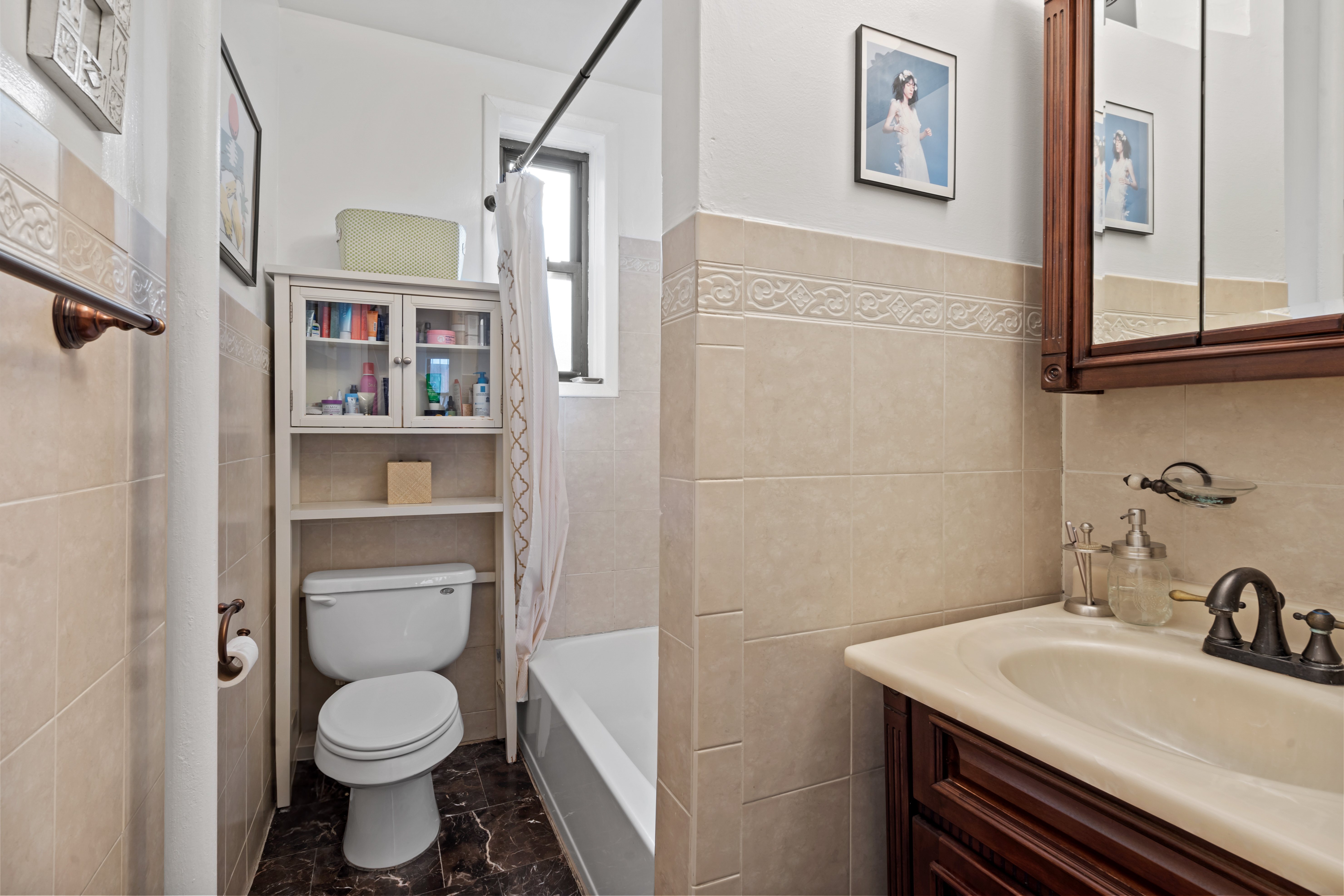 425 Prospect Place, Unit 1J Brooklyn, NY 11238 - Photo 5 of 11 a bathroom with a sink toilet and a mirror