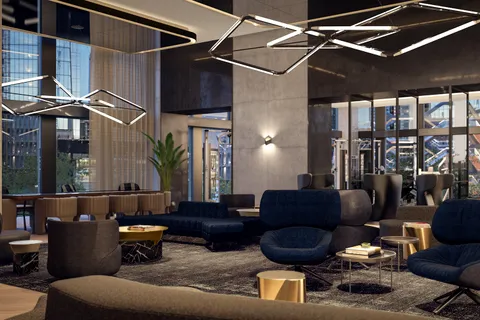 a living room with furniture and a ceiling fan