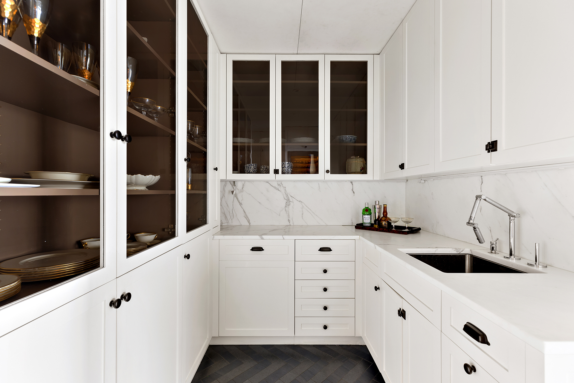 10 Gracie Square, Unit 8D Manhattan, NY 10028 - Photo 11 of 20 a kitchen with white cabinets and window