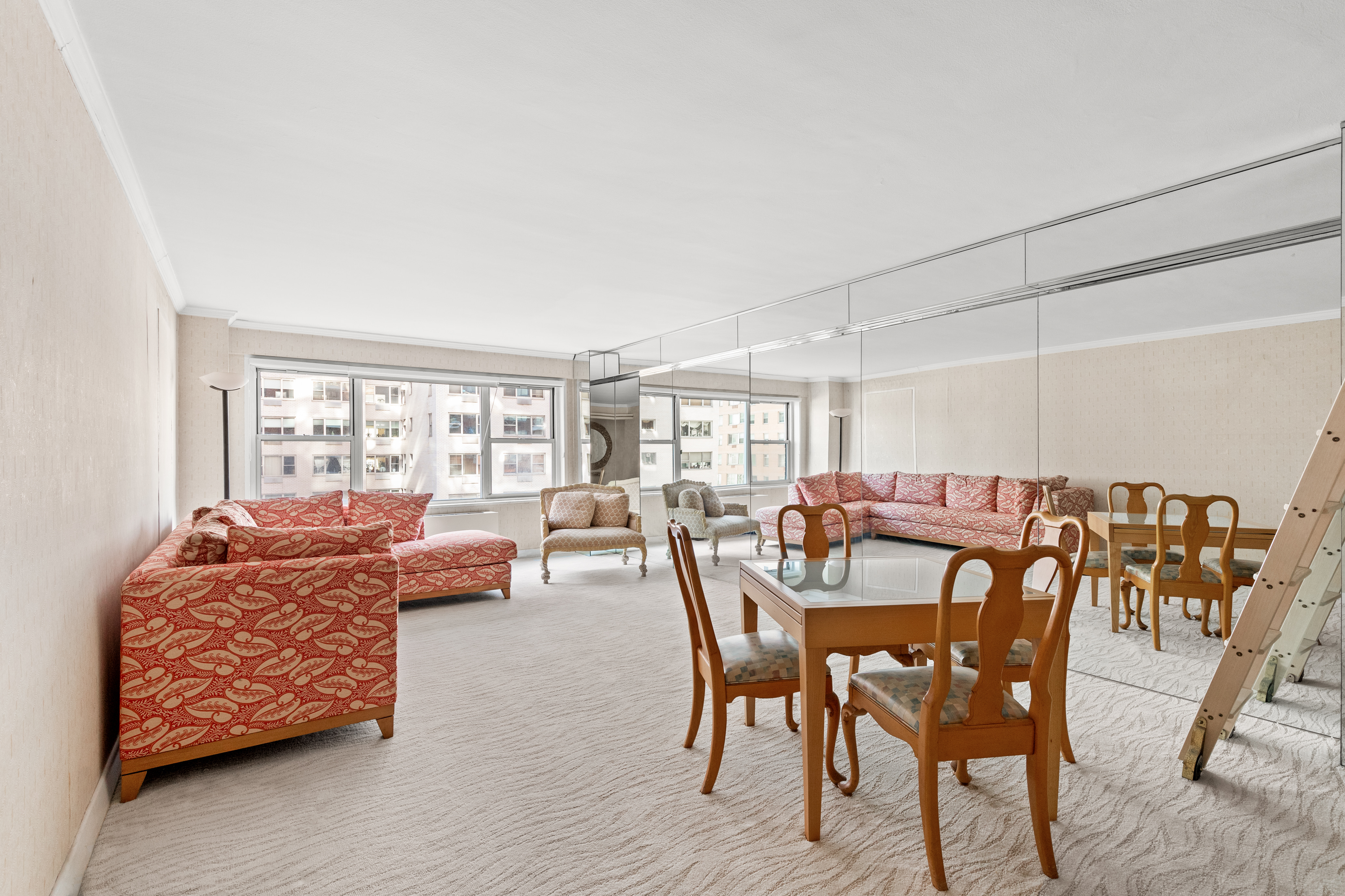 50 Sutton Place South, Unit 7A Manhattan, NY 10022 - Photo 5 of 16 a dining room with furniture and wooden floor