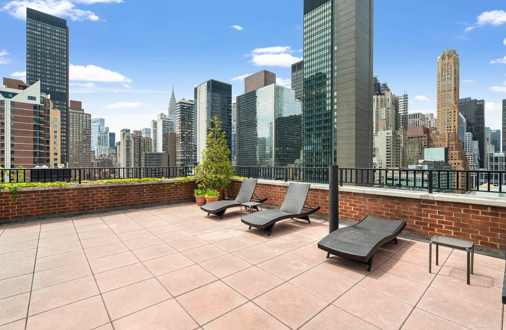 251 East 51st Street, Unit 6K Manhattan, NY 10022 - Photo 14 of 16 a view of a terrace with city view