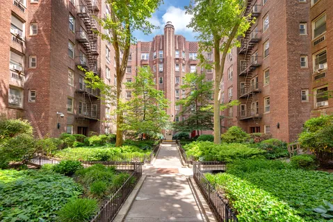 a view of a building with a garden